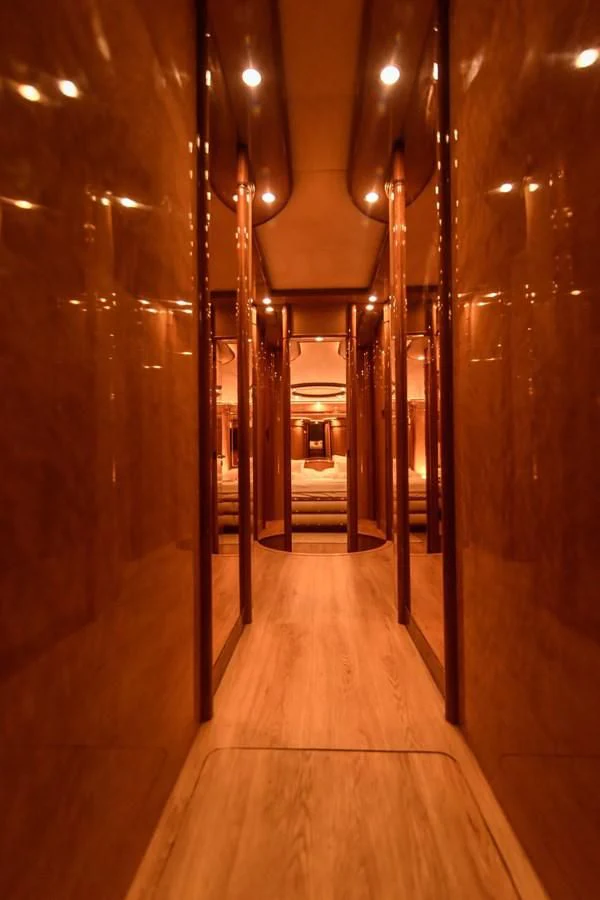 a hallway with many doors aboard NEPHENTA PRIMERO Yacht for Sale