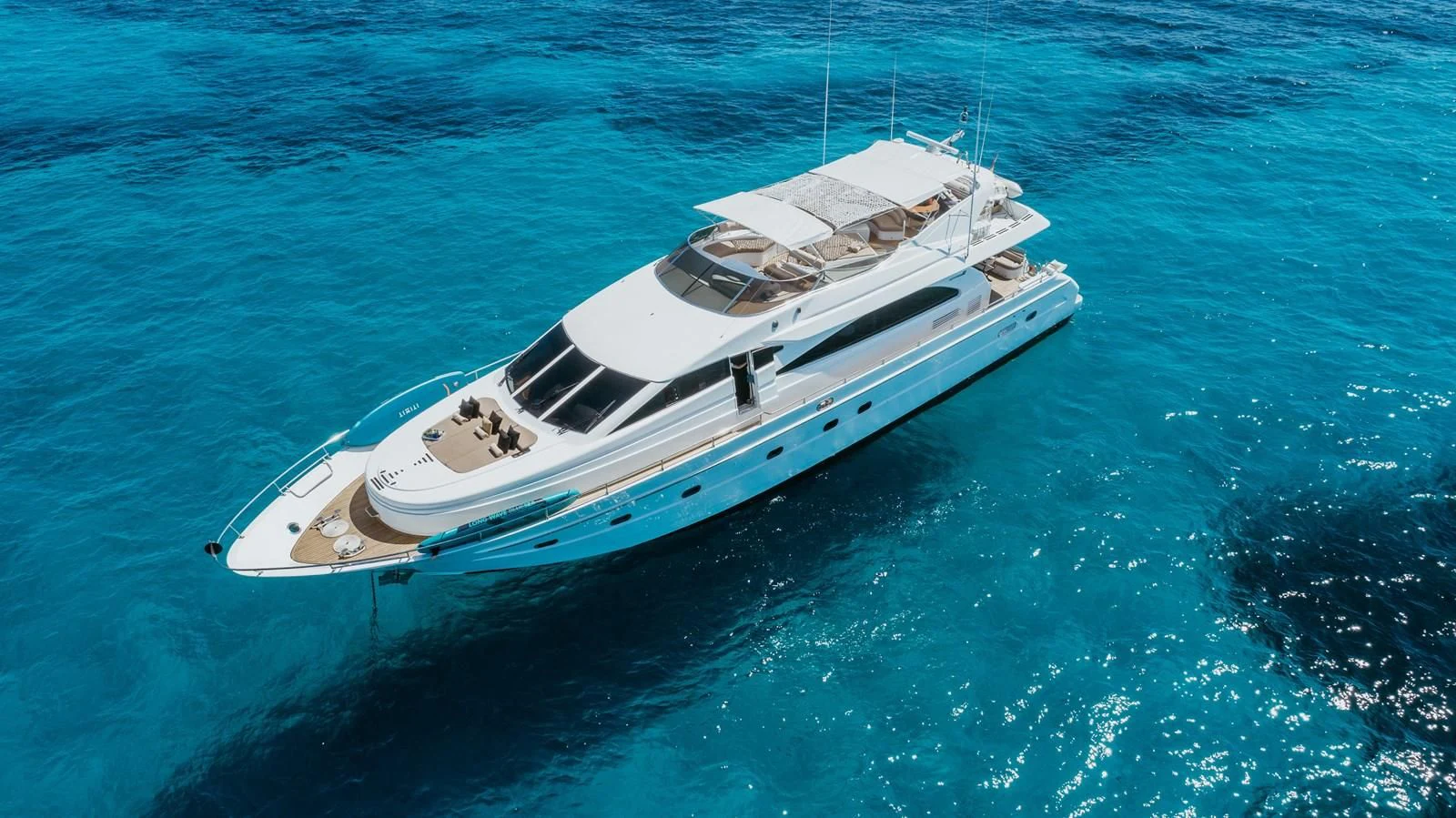 a white yacht in the water aboard NEPHENTA PRIMERO Yacht for Sale