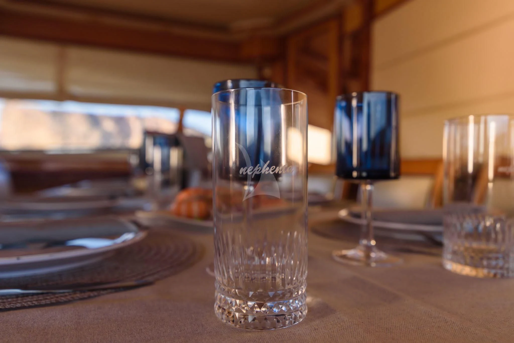 a group of glasses on a table aboard NEPHENTA PRIMERO Yacht for Sale