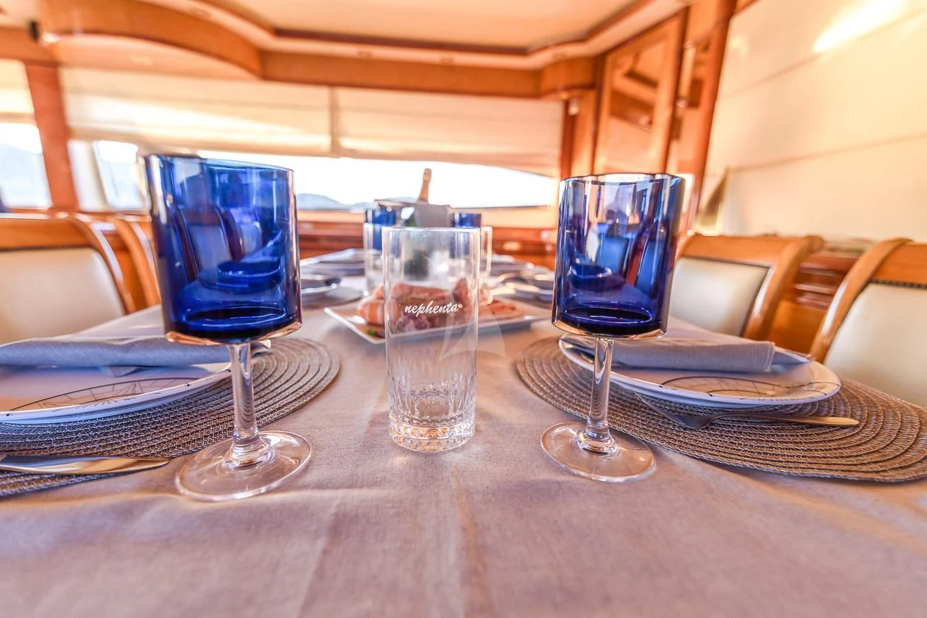 a group of glasses on a table aboard NEPHENTA PRIMERO Yacht for Sale