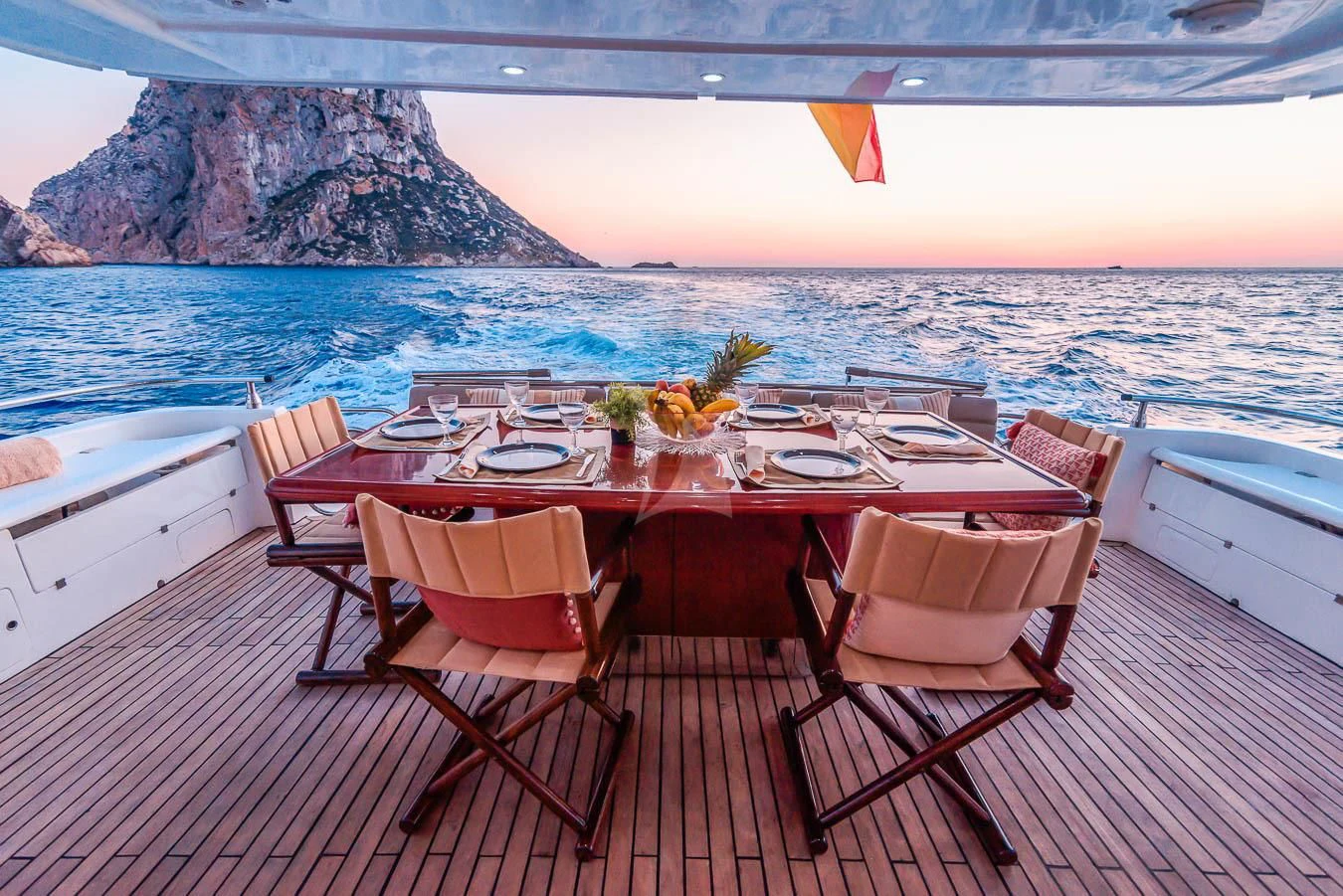 a table set for dinner on a boat aboard NEPHENTA PRIMERO Yacht for Sale