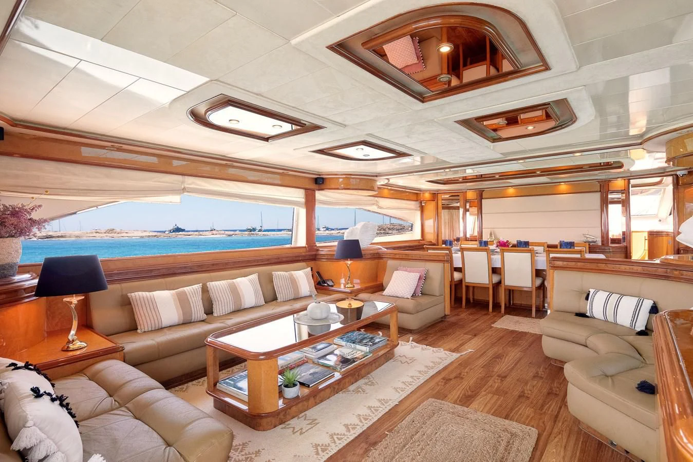 a living room with a large open floor plan aboard NEPHENTA PRIMERO Yacht for Sale