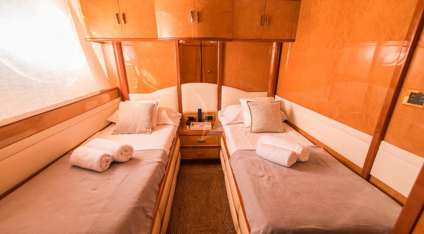 a room with two beds aboard NEPHENTA PRIMERO Yacht for Sale