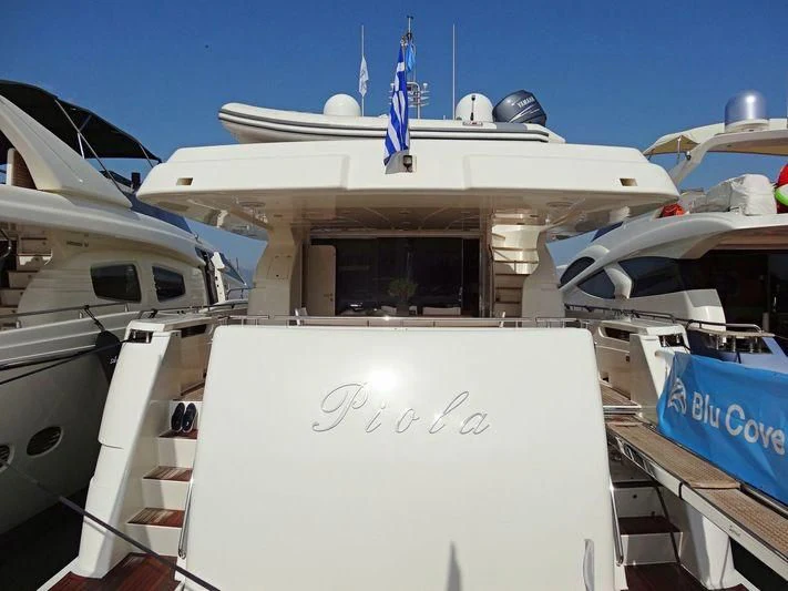 a boat with a blue stripe aboard PIOLA Yacht for Sale