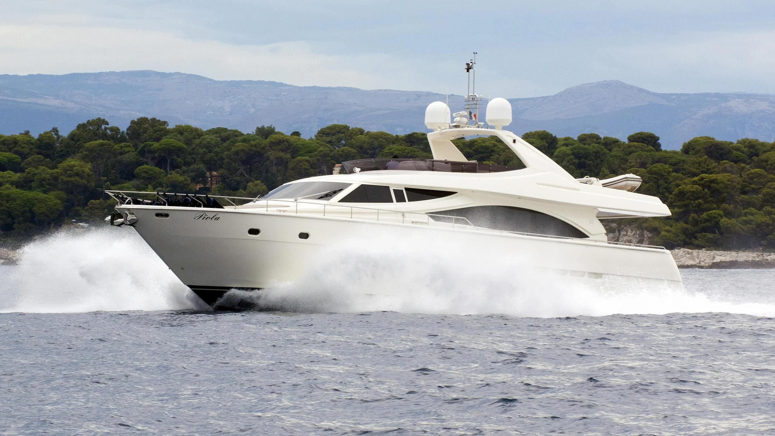 a white yacht with smoke coming out of it aboard PIOLA Yacht for Sale