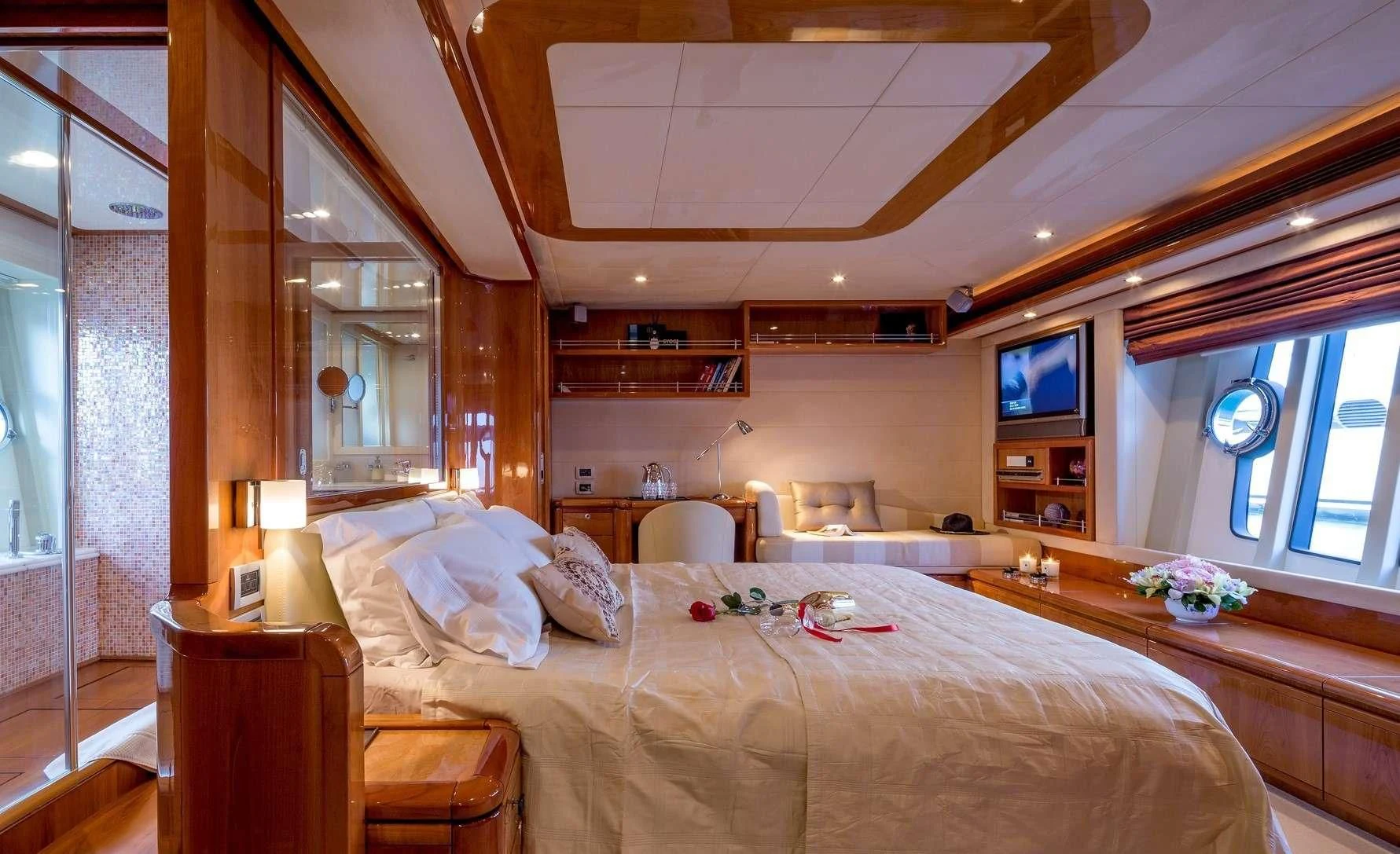 a large bedroom with a bed aboard PIOLA Yacht for Sale