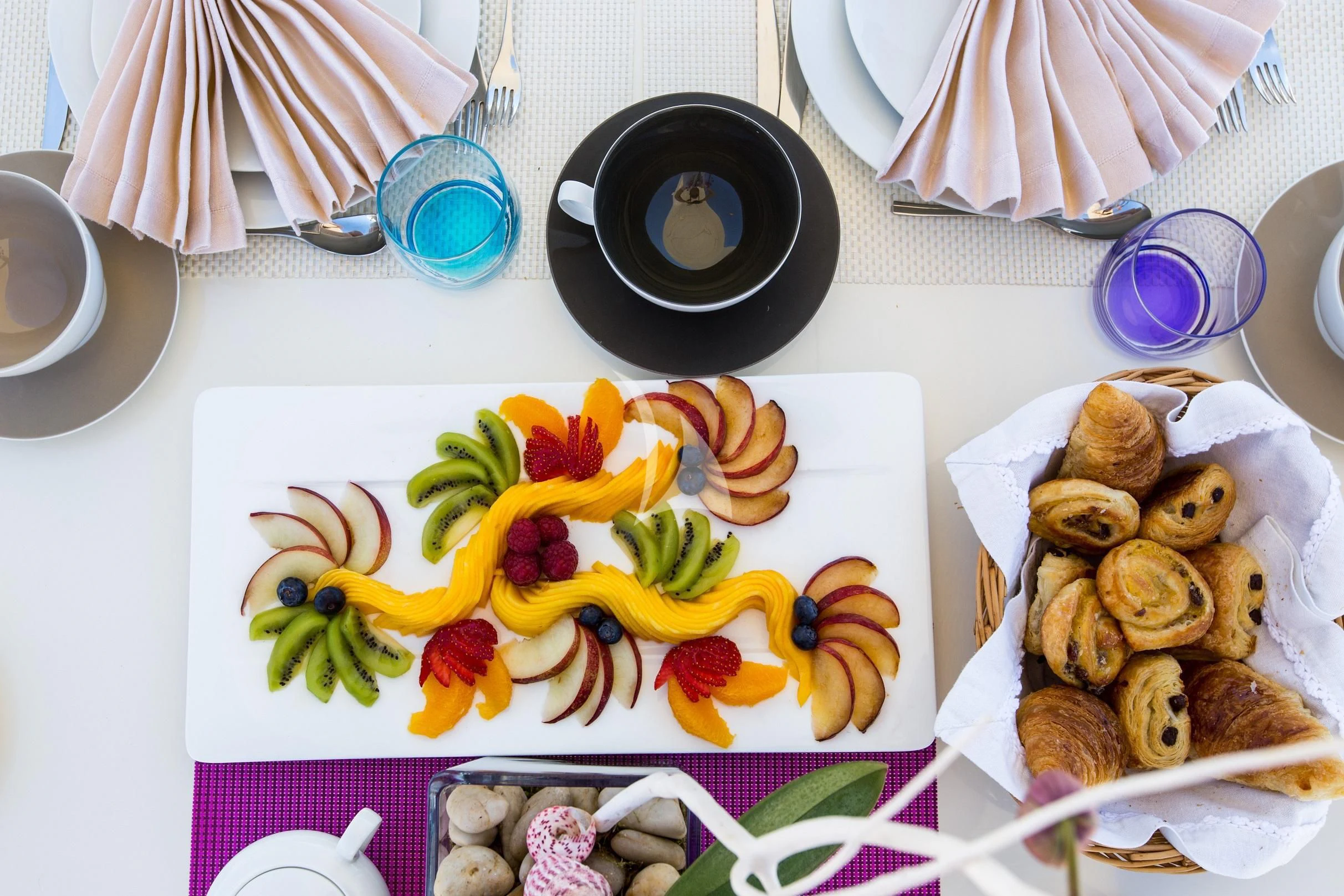 a plate of food aboard PIOLA Yacht for Sale