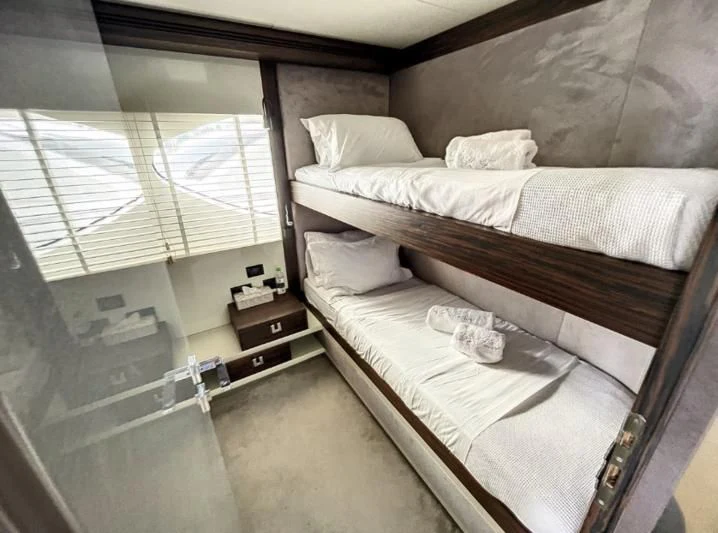 a room with two beds aboard LA FENICE Yacht for Charter
