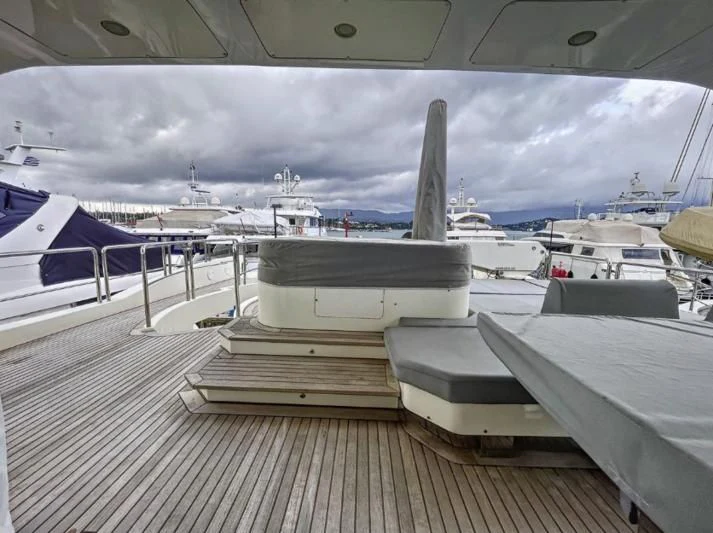 a deck with a row of boats aboard LA FENICE Yacht for Charter