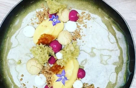 a plate of food aboard NAVILUX Yacht for Sale