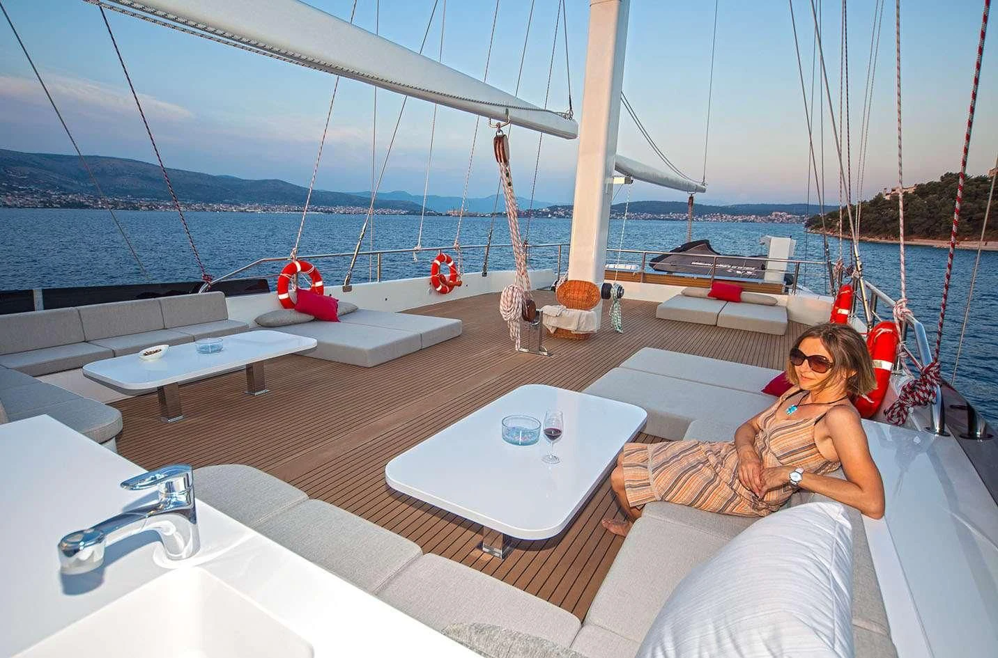 a person sitting on a boat aboard NAVILUX Yacht for Sale
