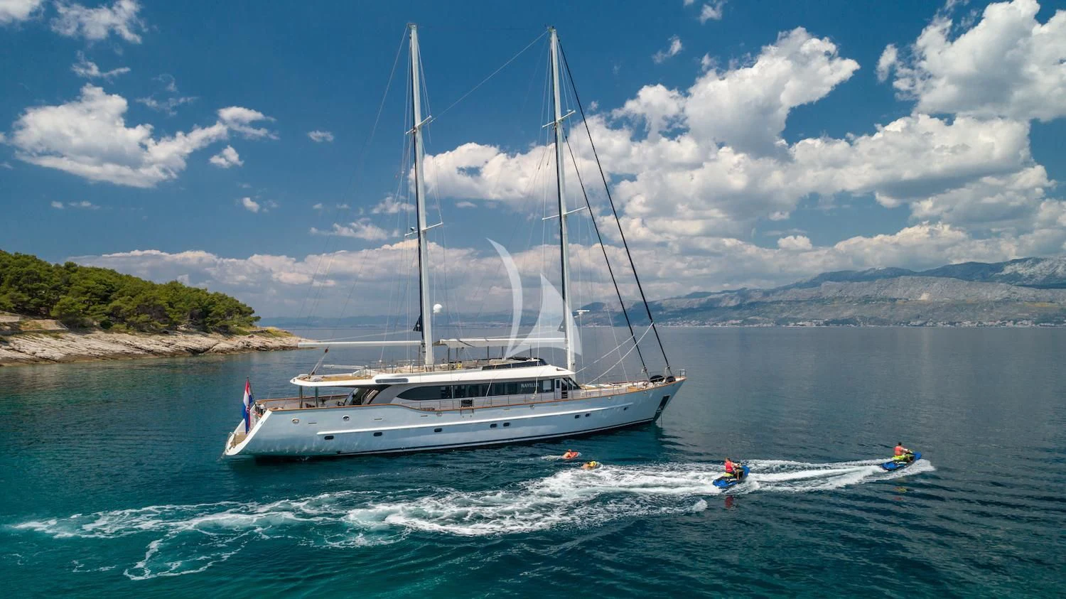 a boat sailing on the sea aboard NAVILUX Yacht for Sale