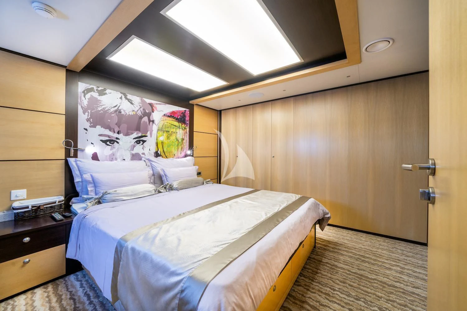 a room with two beds aboard NAVILUX Yacht for Sale