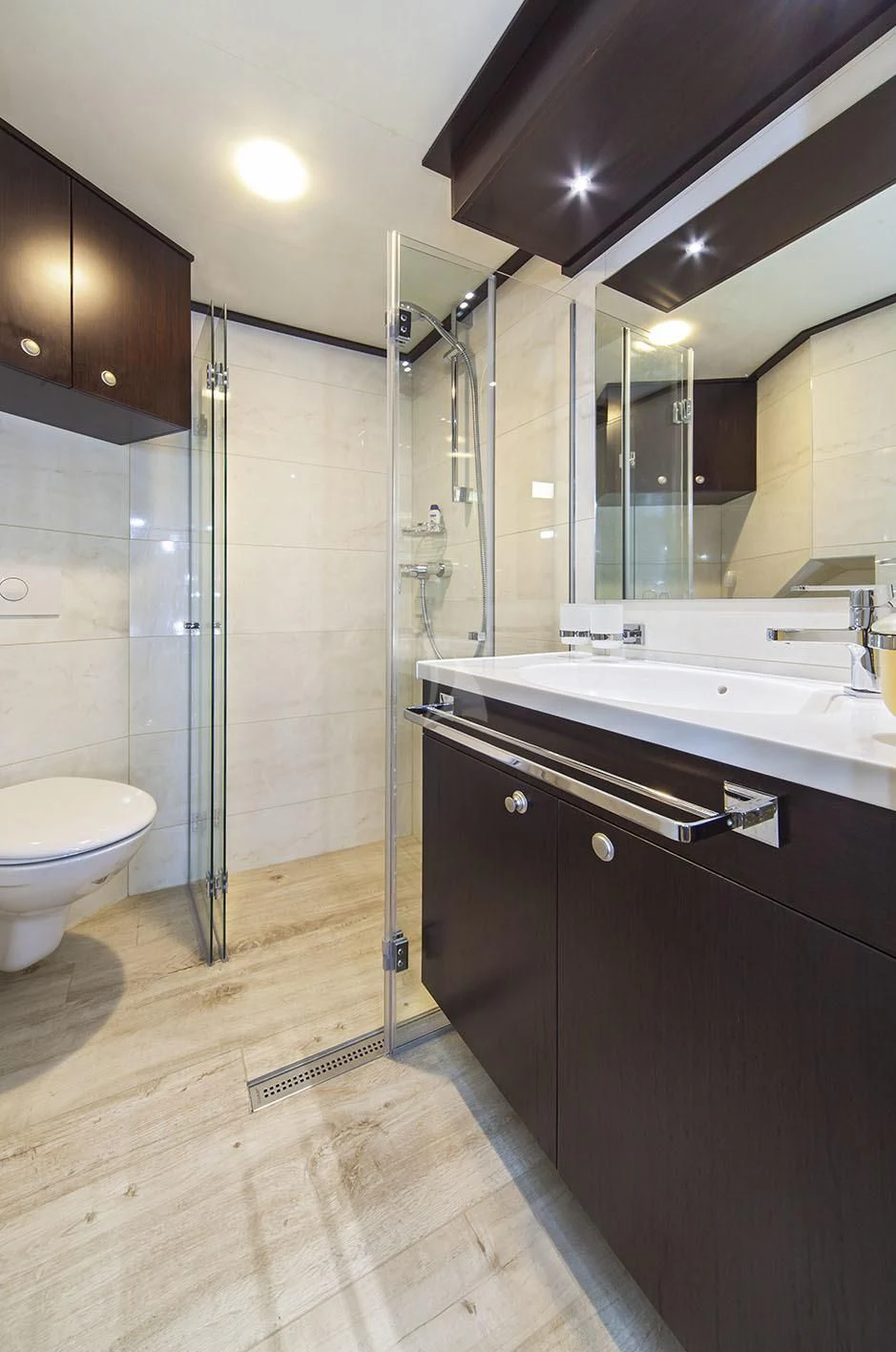 a bathroom with a glass shower aboard NAVILUX Yacht for Sale