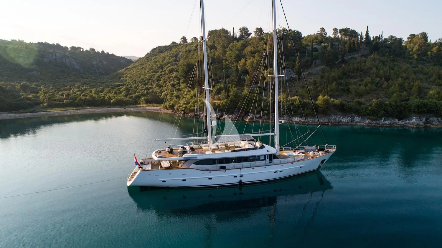 a sailboat on the water aboard NAVILUX Yacht for Sale