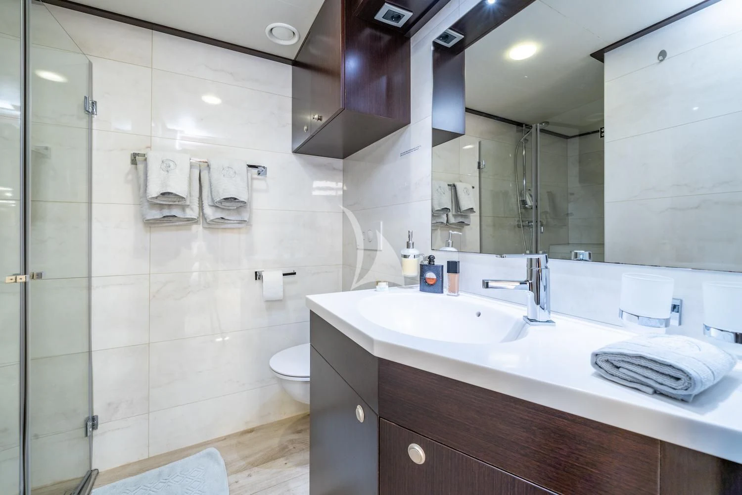 a bathroom with a large mirror aboard NAVILUX Yacht for Sale