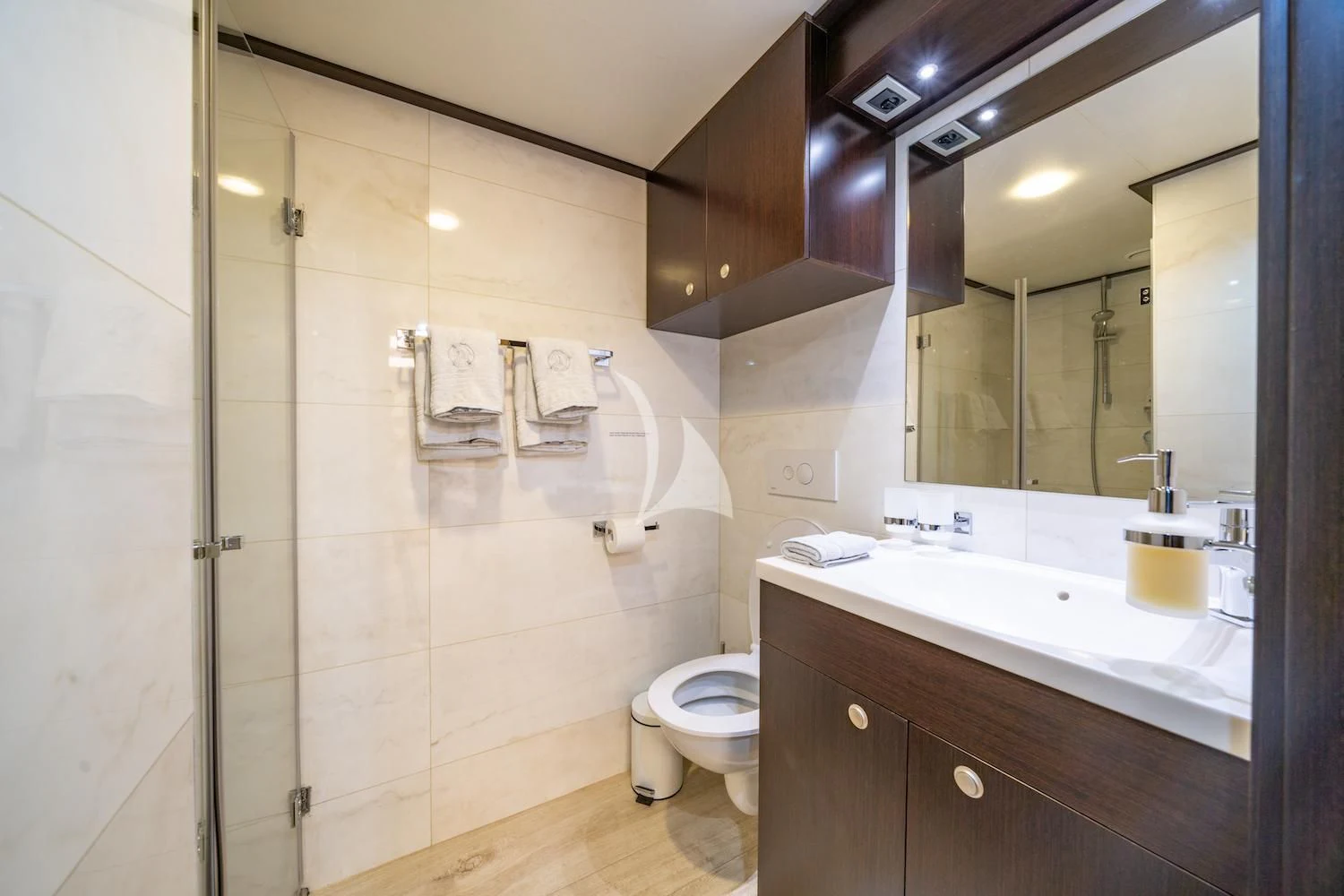 a bathroom with a glass shower aboard NAVILUX Yacht for Sale