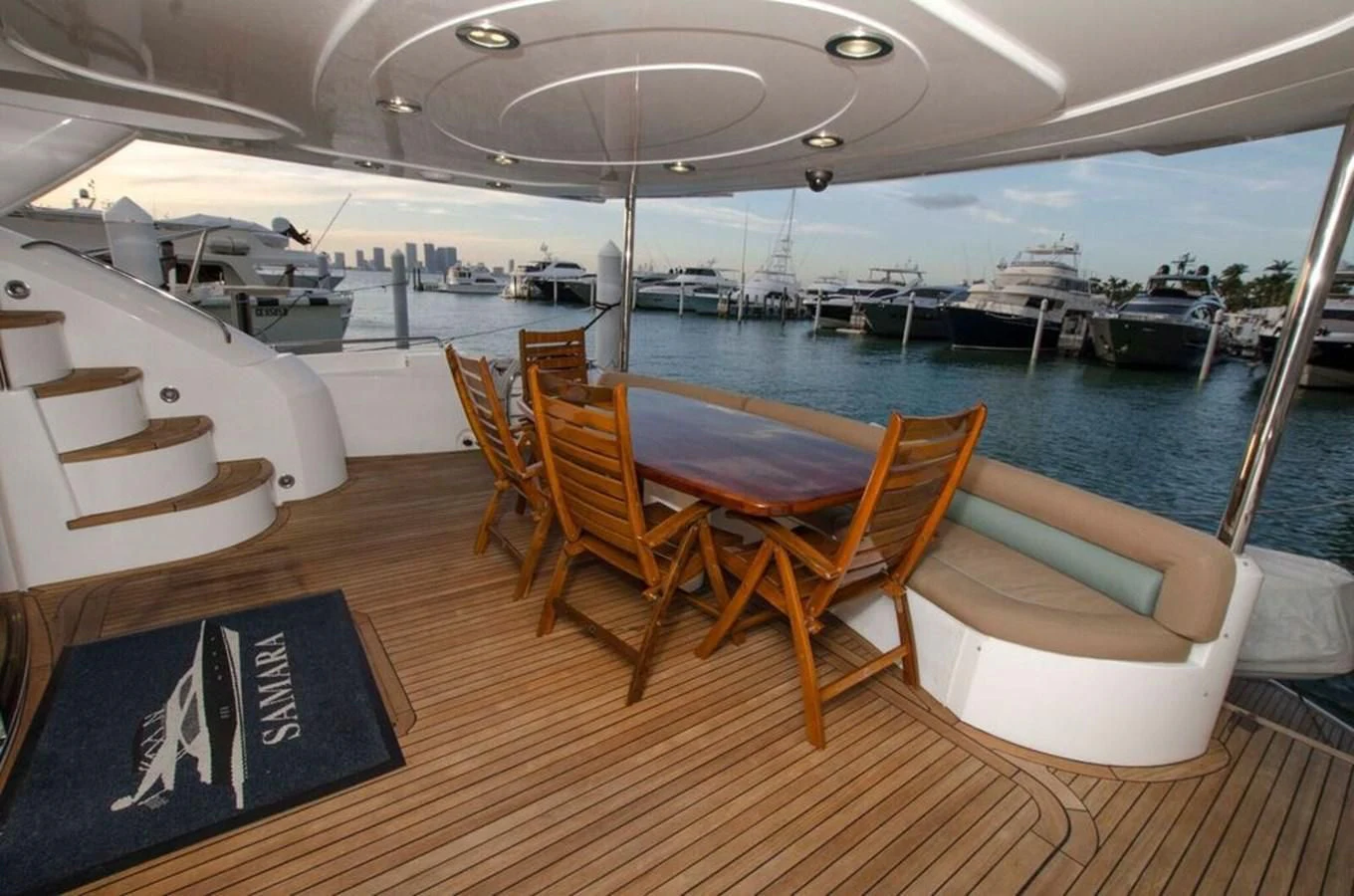a boat with chairs and tables aboard SAMARA Yacht for Sale