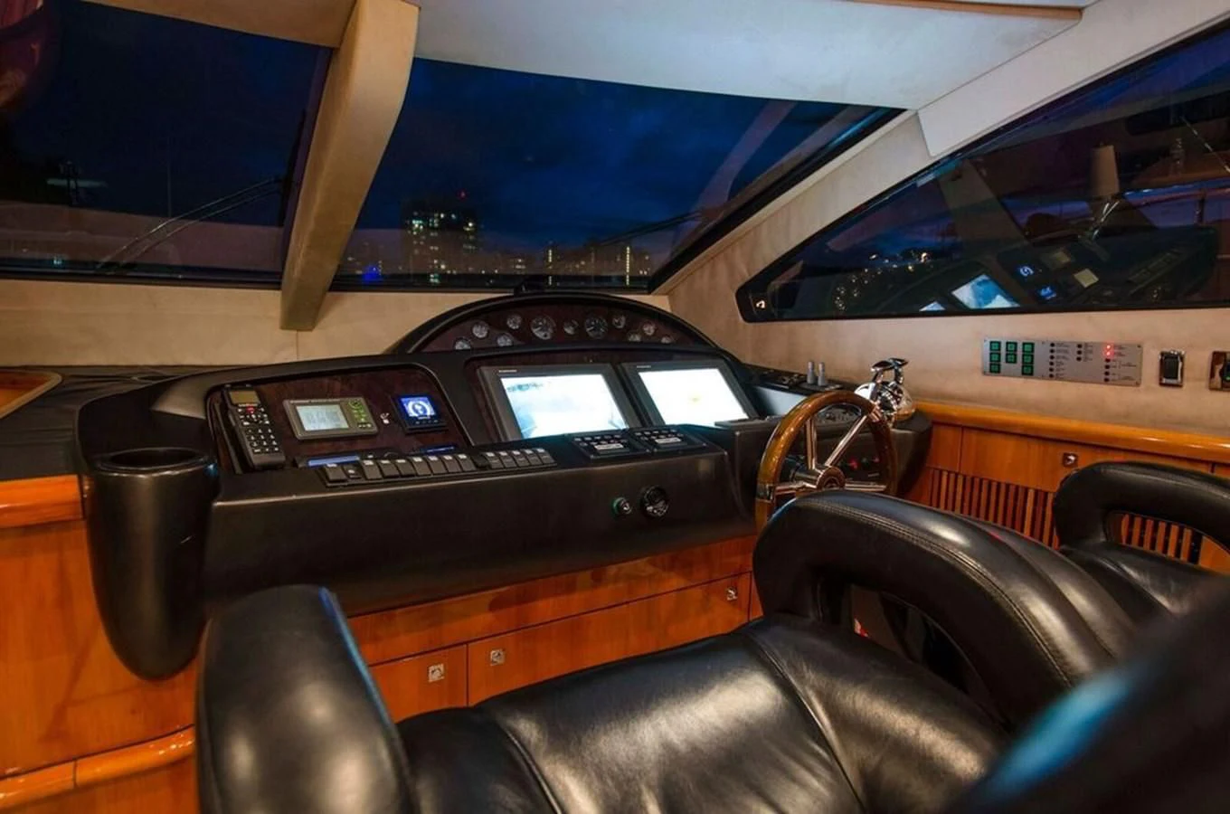 a car with a radio in the back aboard SAMARA Yacht for Sale