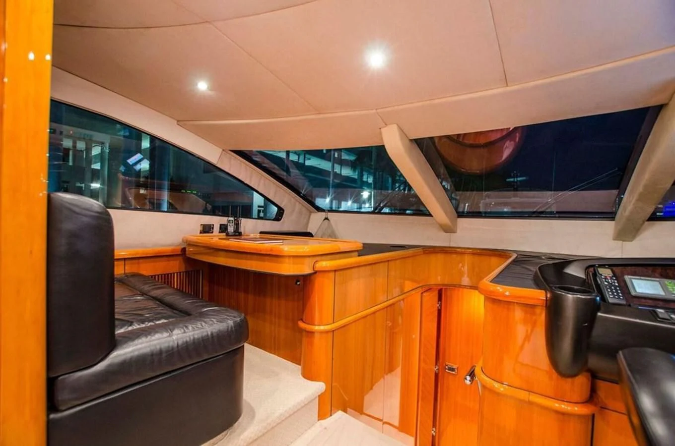 a room with a desk and chairs aboard SAMARA Yacht for Sale