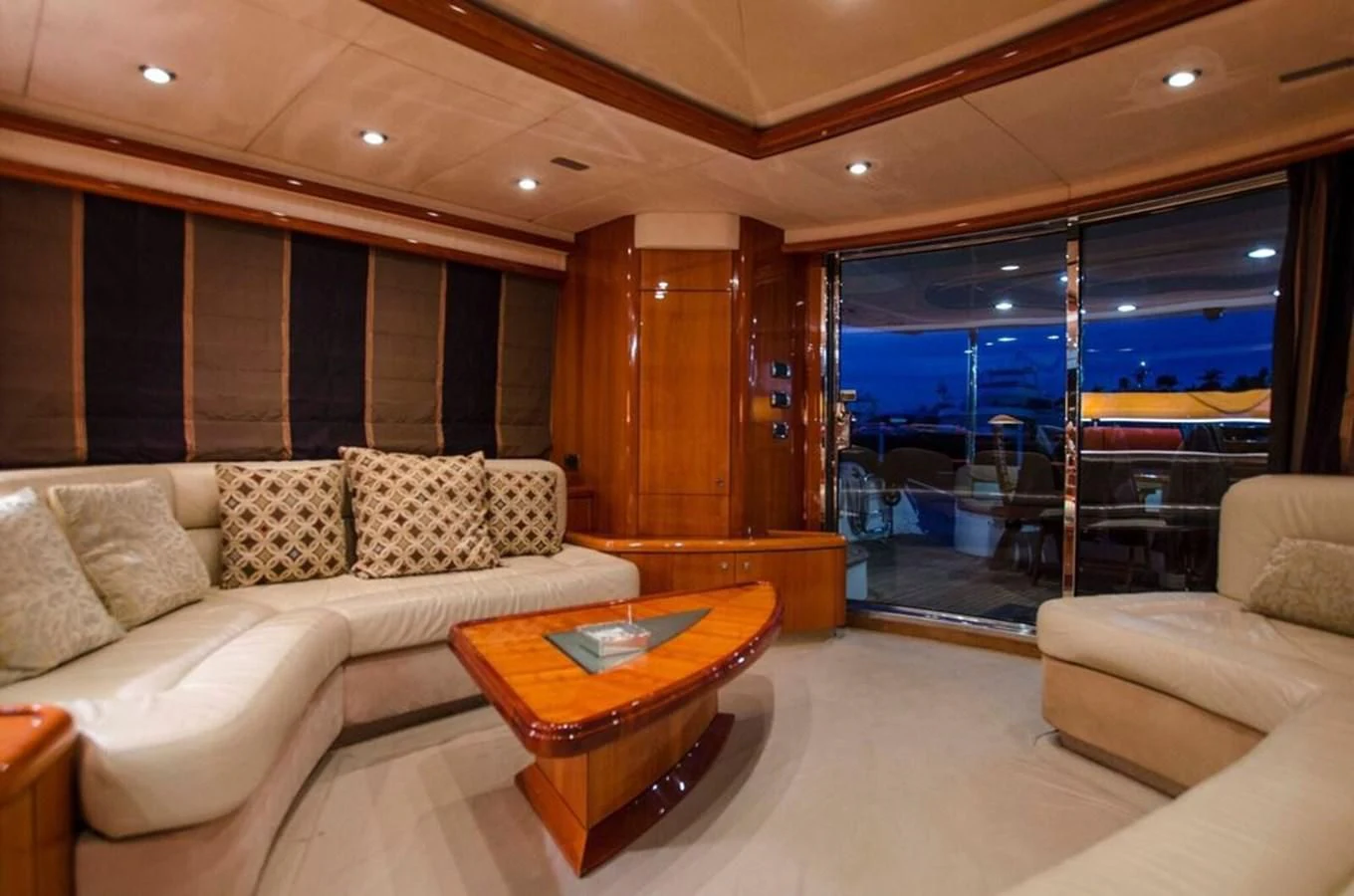 a living room with a couch and a table aboard SAMARA Yacht for Sale