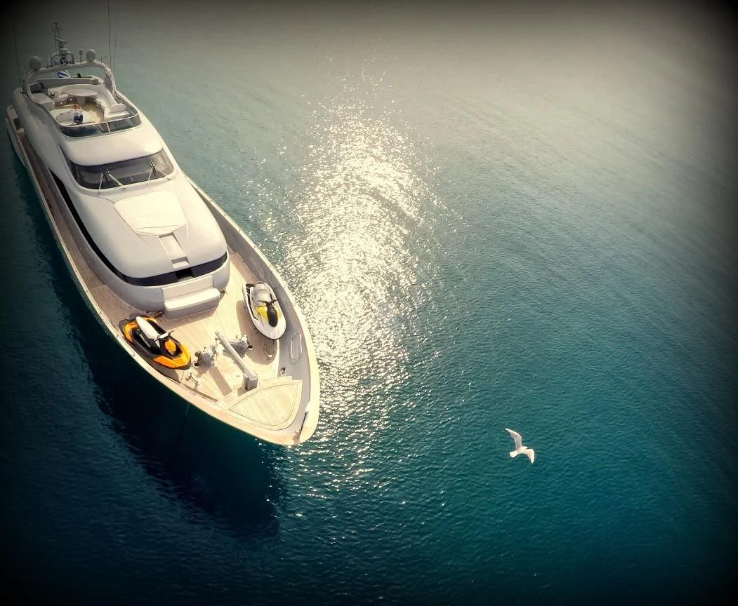 a boat in the water aboard IF Yacht for Sale