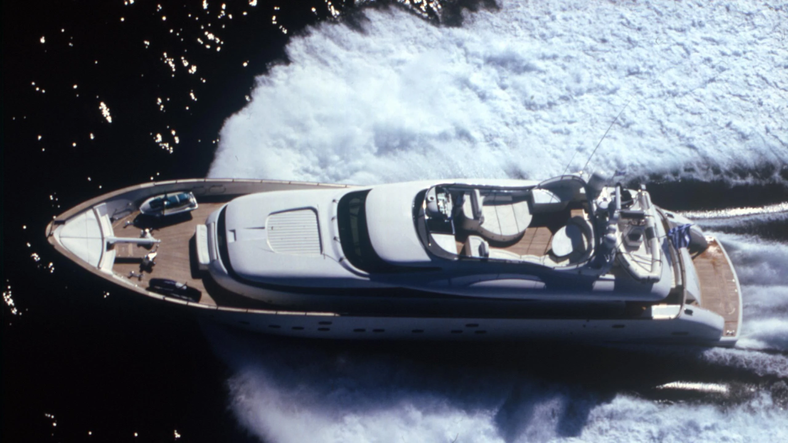 a car driving on a snowy road aboard IF Yacht for Sale