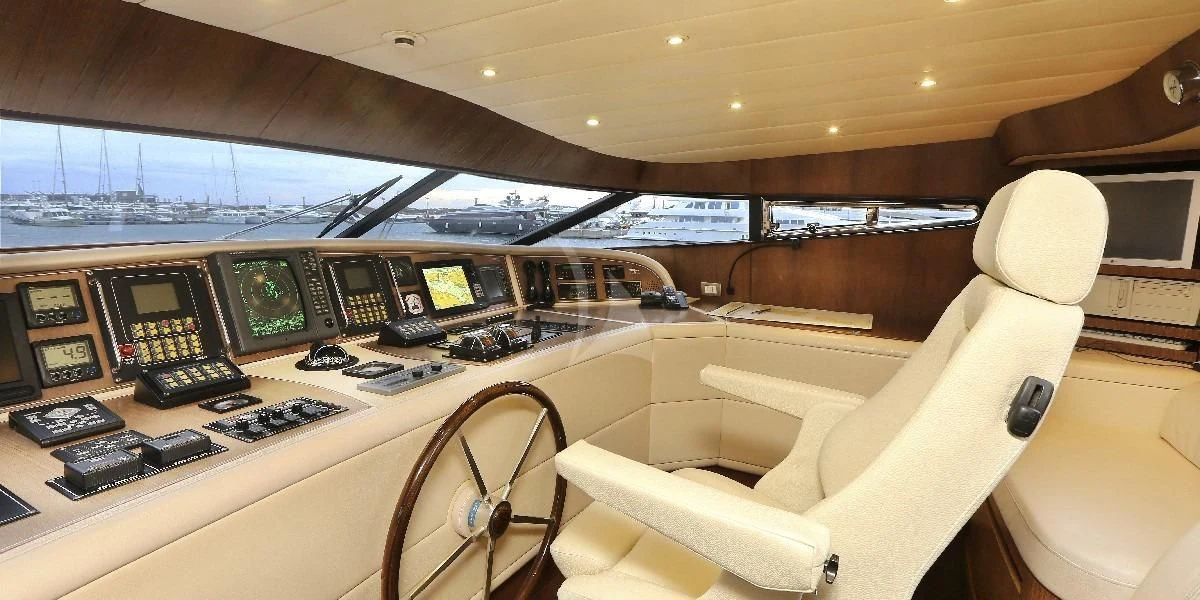 a plane cockpit with many computers aboard IF Yacht for Sale