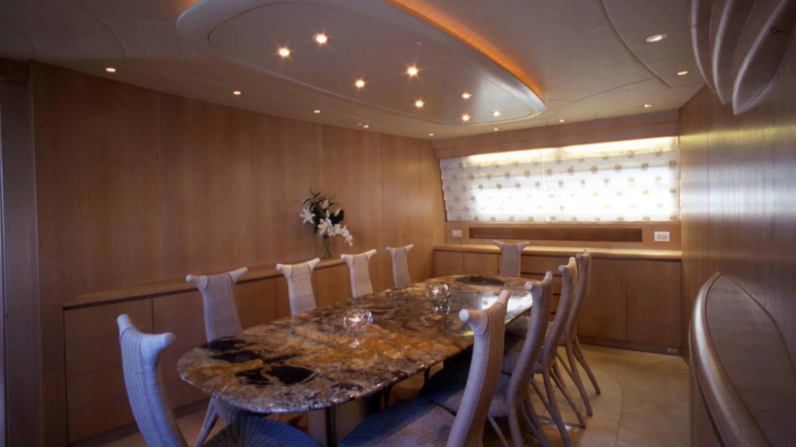 a dining table set for a dinner party aboard IF Yacht for Sale