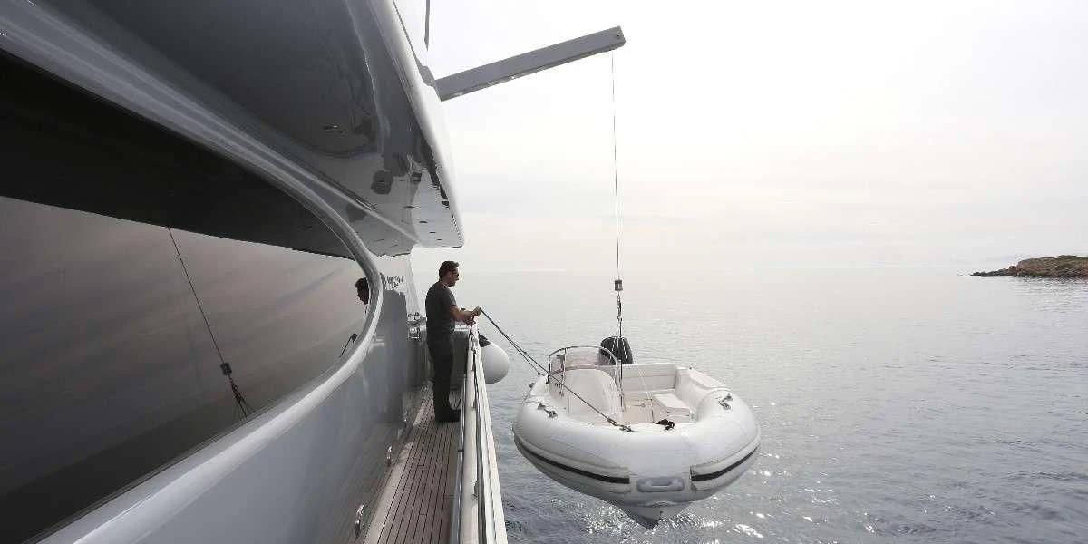 a person standing on a boat aboard IF Yacht for Sale