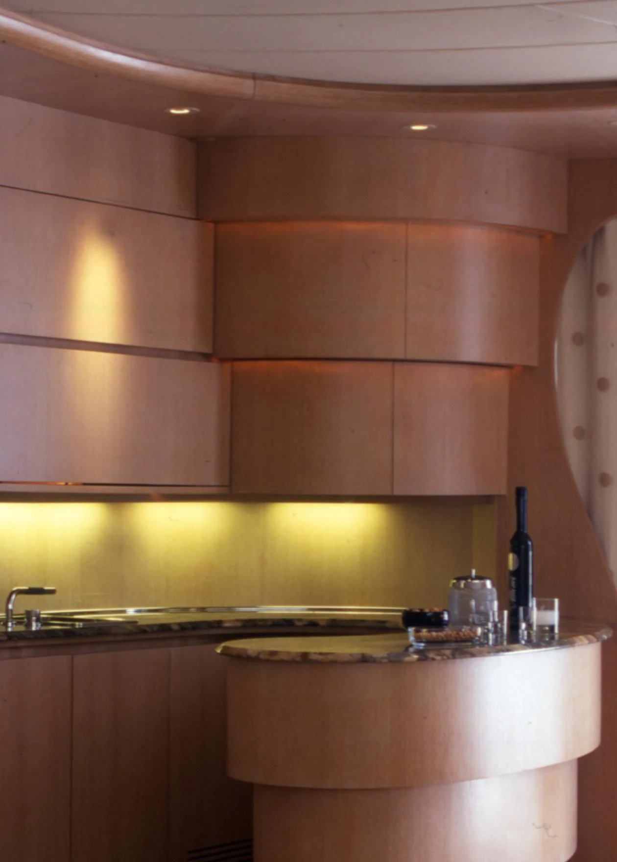 a kitchen with a sink and cabinets aboard IF Yacht for Sale