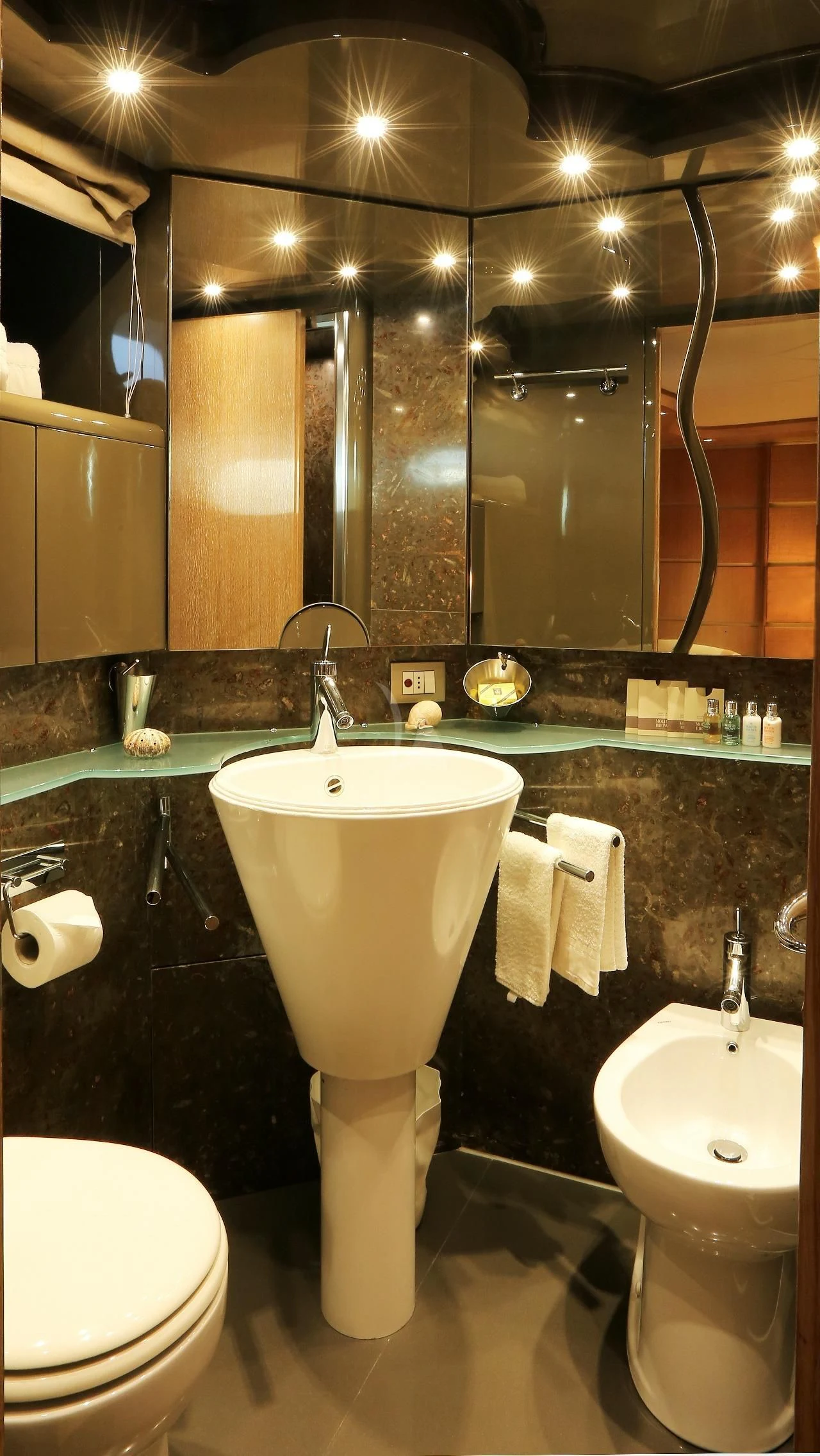 a bathroom with a sink and a toilet aboard IF Yacht for Sale