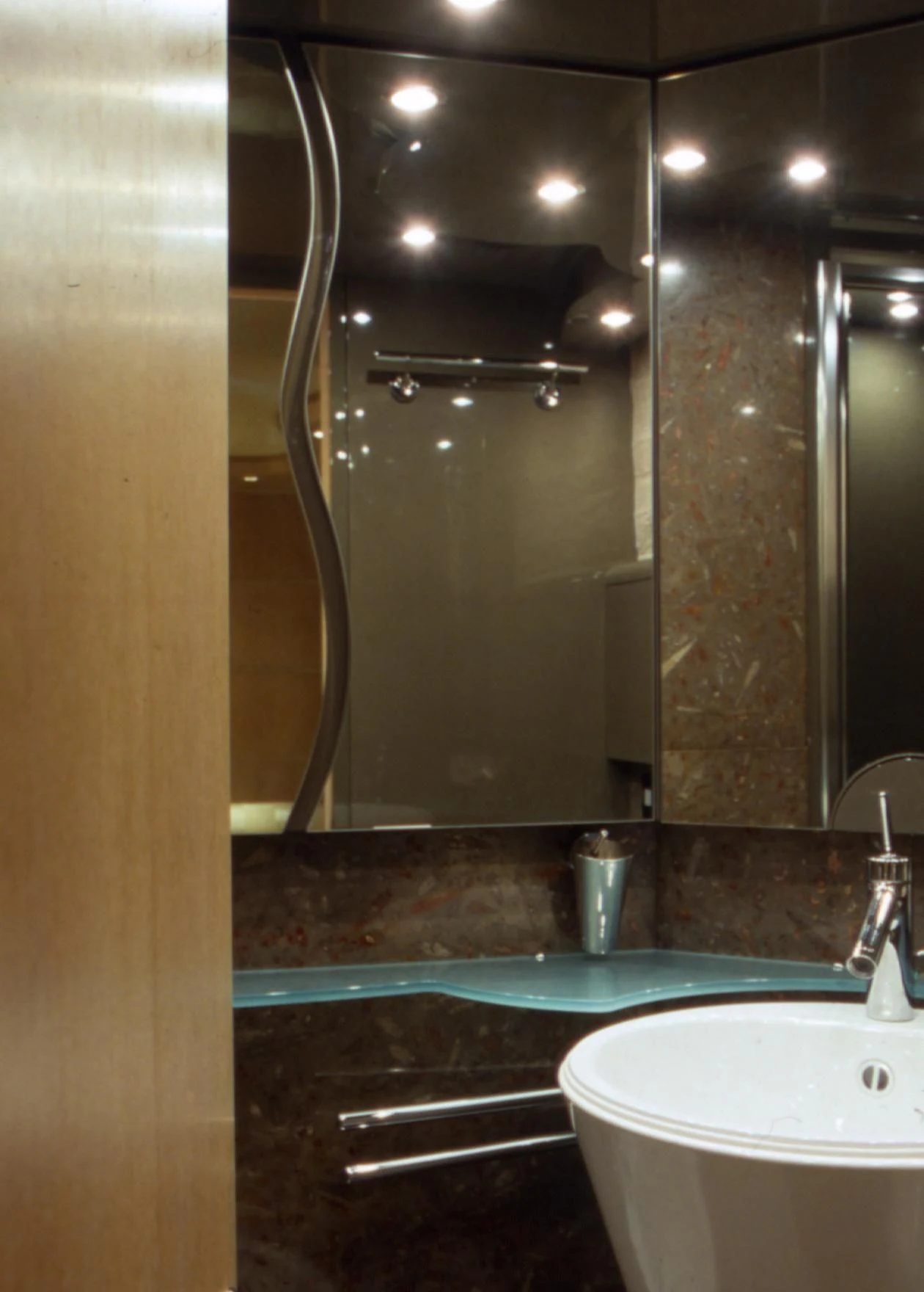 a bathroom with a large mirror aboard IF Yacht for Sale