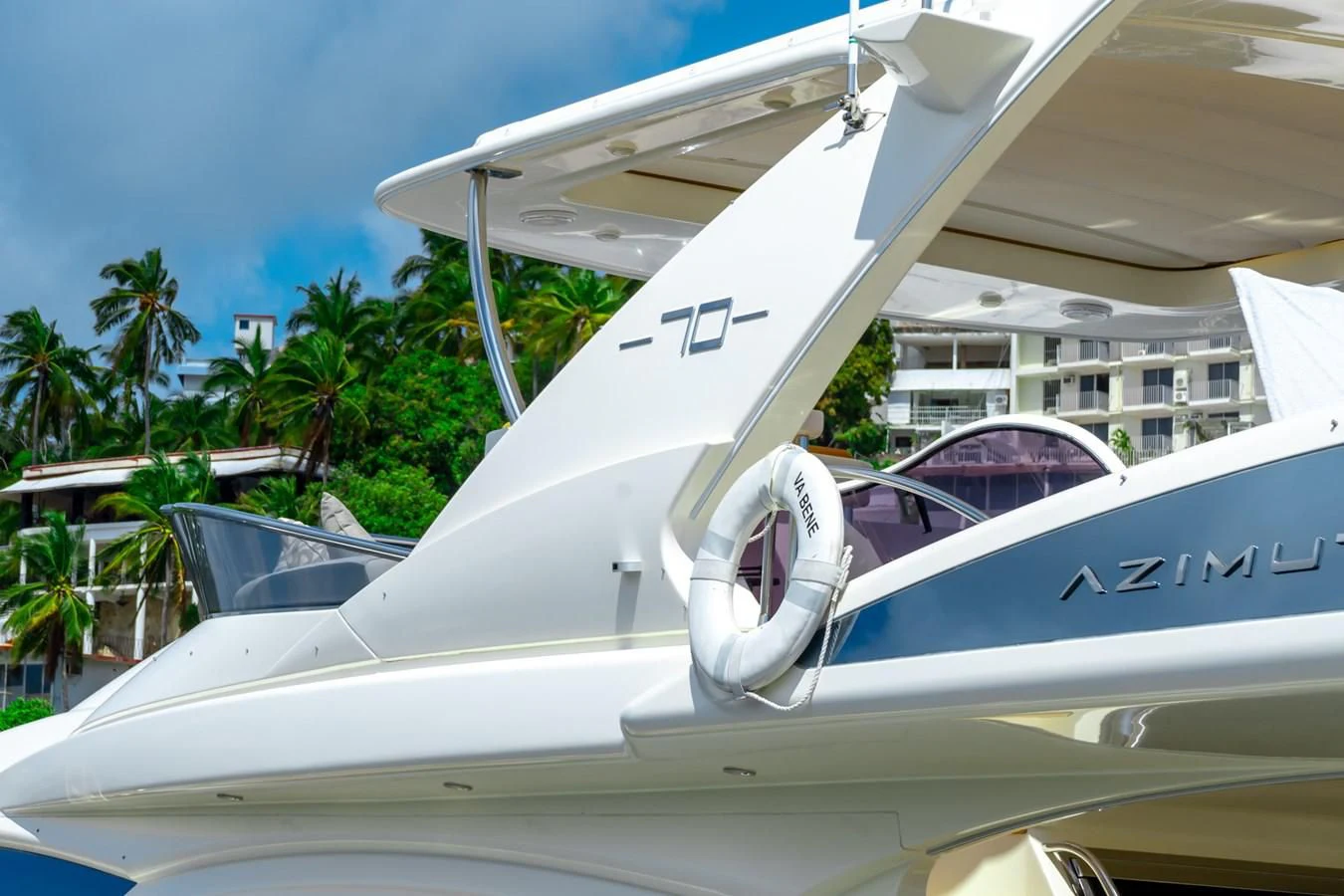 a plane parked in front of a building aboard VA BENE 2011 AZIMUT 70 FLY Yacht for Sale