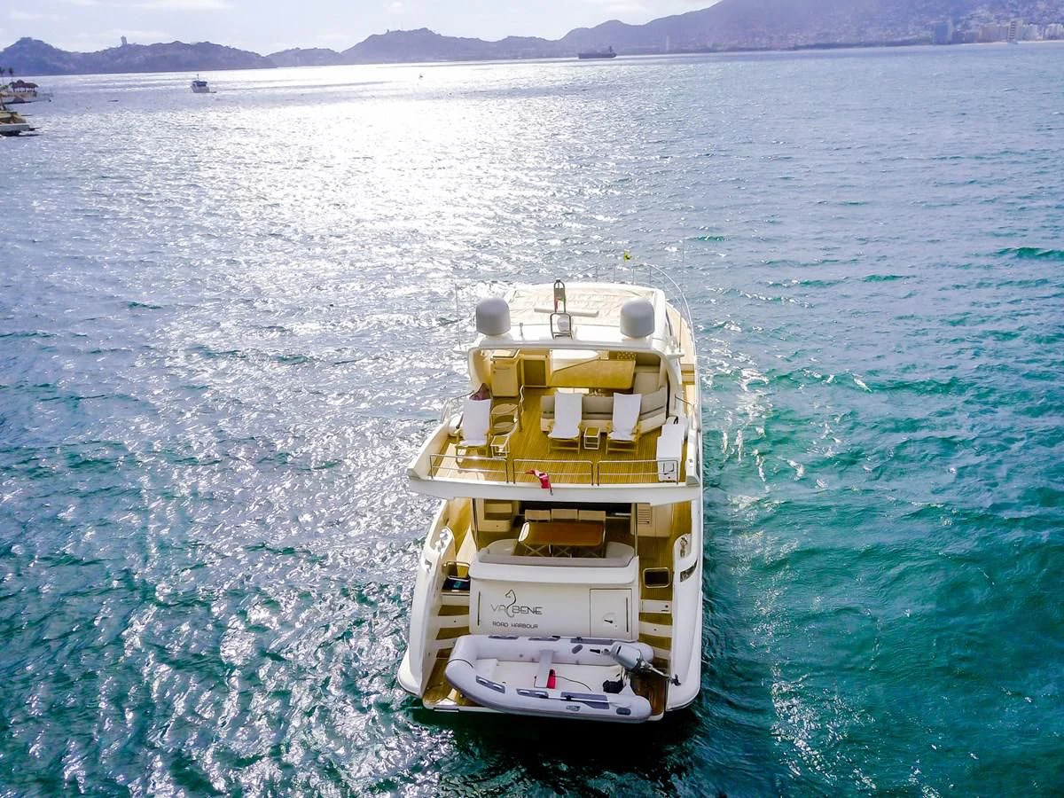 a yellow and white boat in the water aboard VA BENE 2011 AZIMUT 70 FLY Yacht for Sale