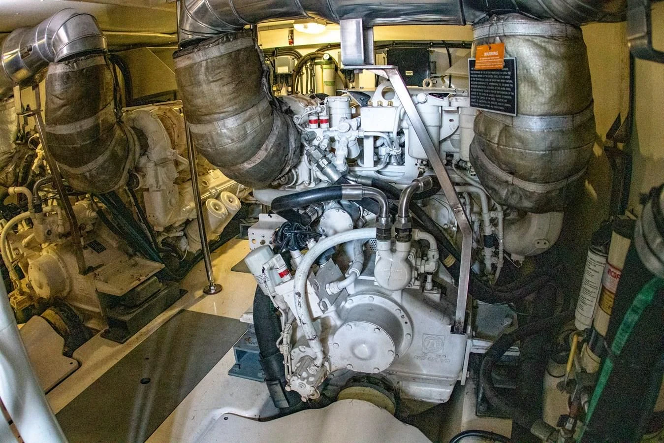 a machine with a large piece of equipment in it aboard VA BENE 2011 AZIMUT 70 FLY Yacht for Sale