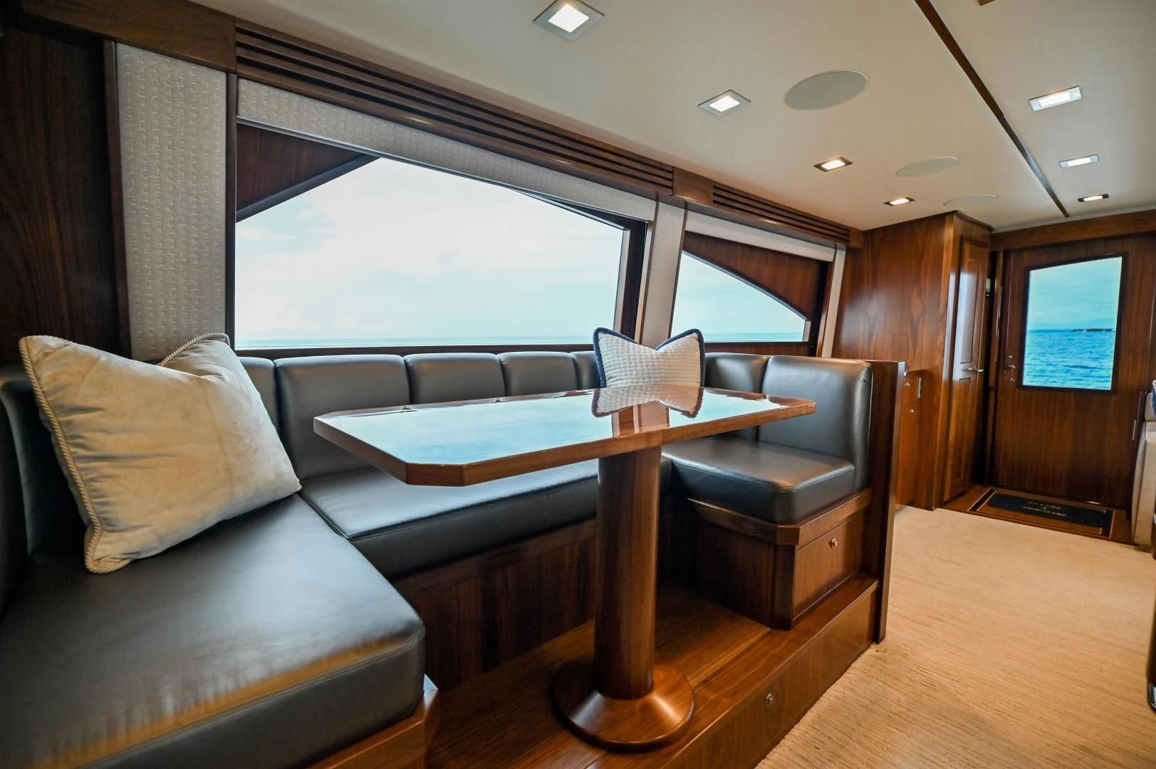 a living room with a couch and a table aboard EL LOBO Yacht for Sale