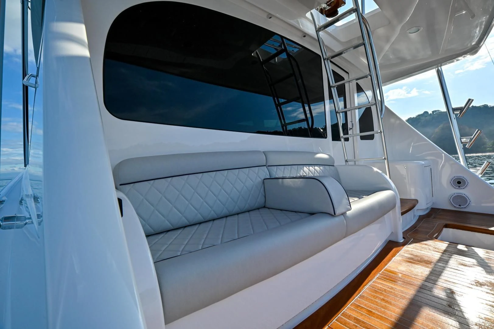a white boat with a large window aboard EL LOBO Yacht for Sale