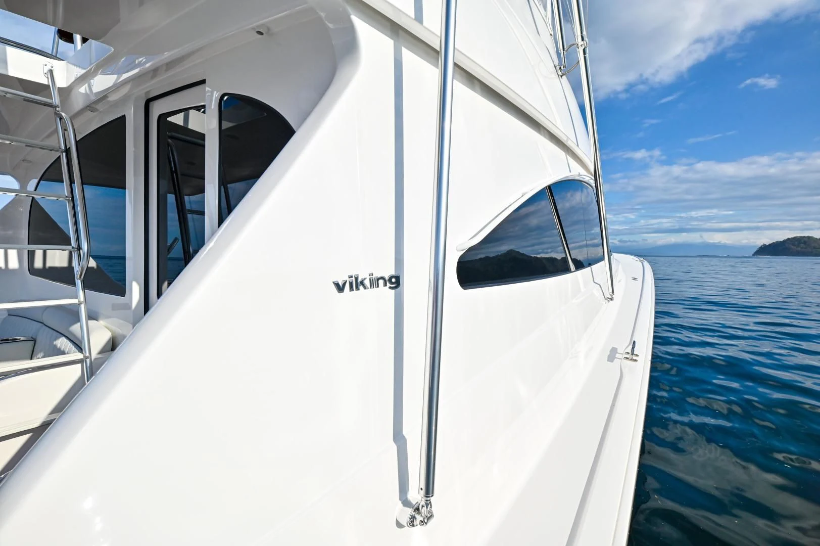 a white boat on the water aboard EL LOBO Yacht for Sale