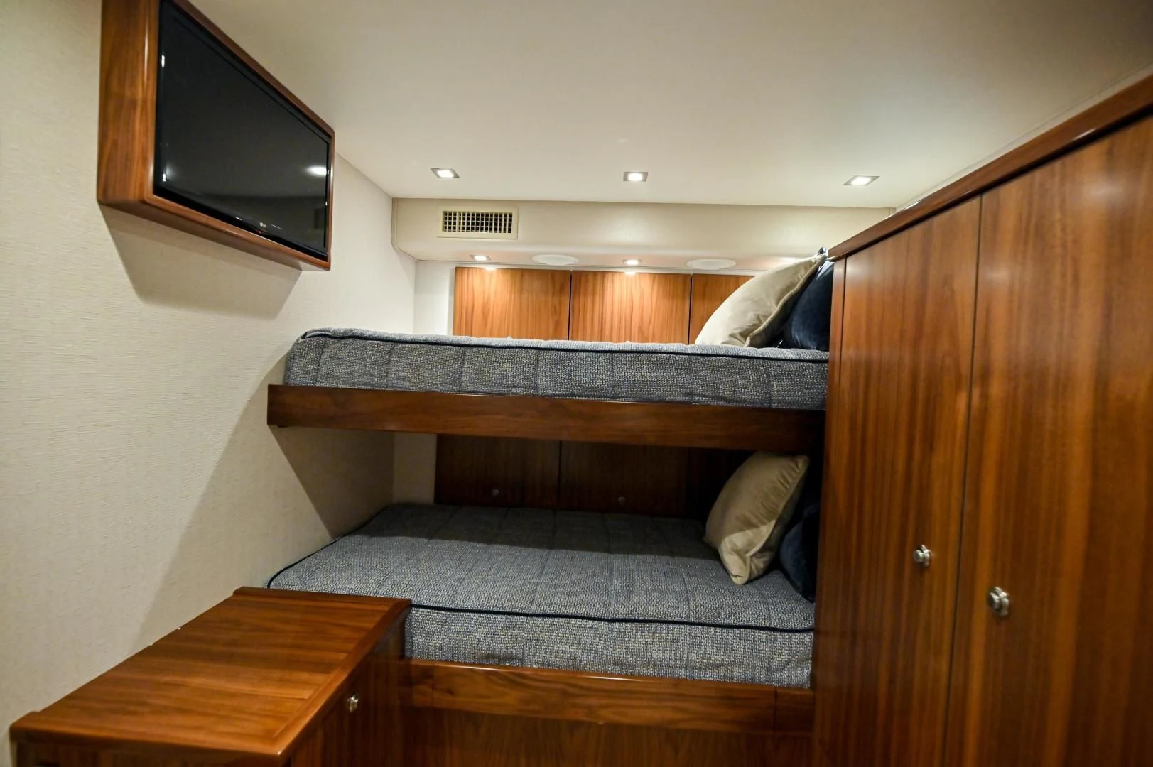 a bed in a room aboard EL LOBO Yacht for Sale