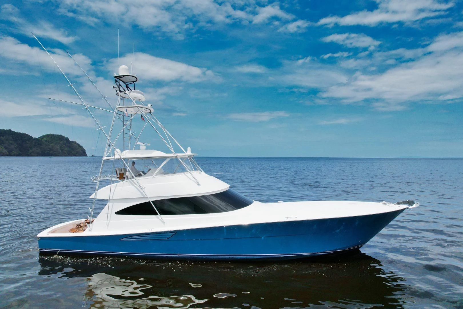 a white boat on the water aboard EL LOBO Yacht for Sale
