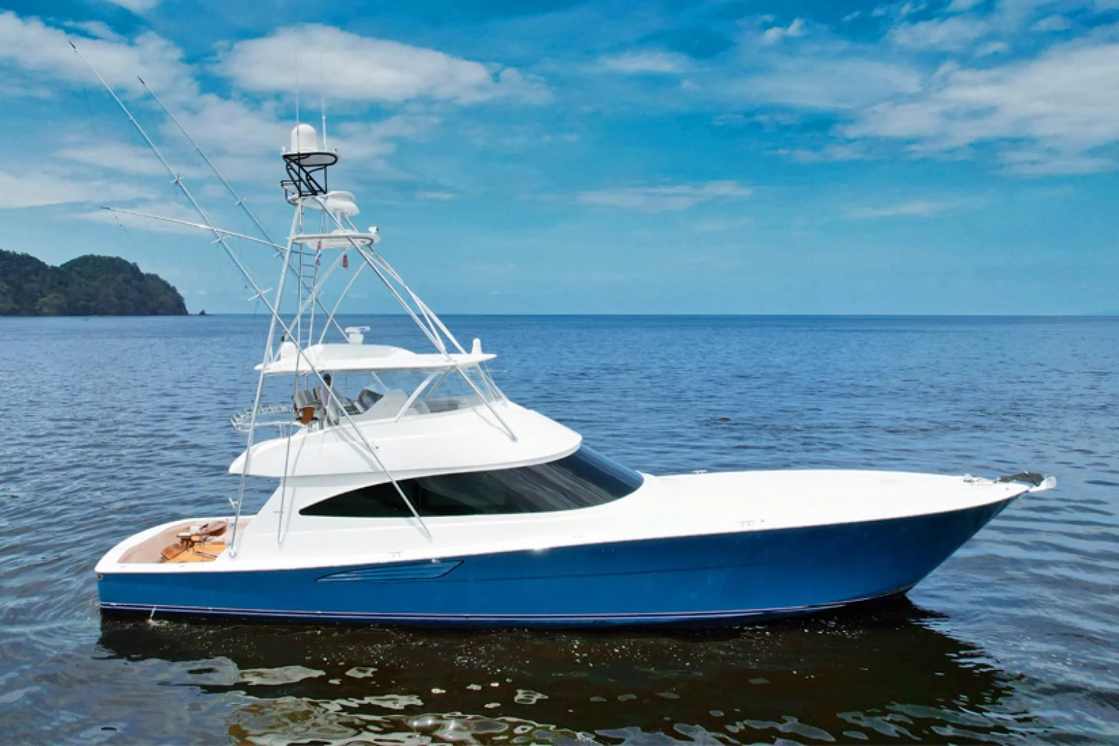 a white boat on the water aboard EL LOBO Yacht for Sale