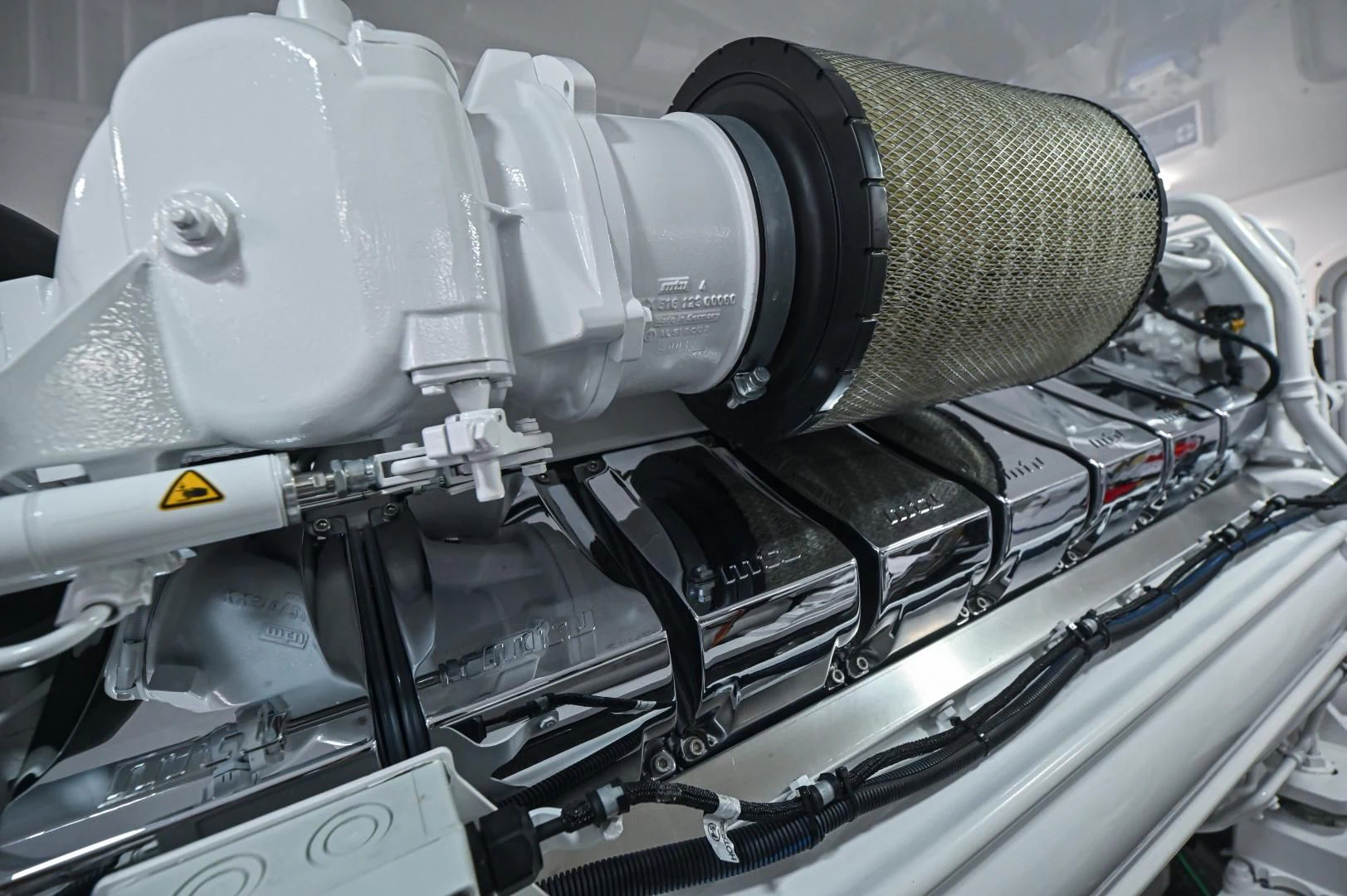 a machine with a large metal cylinder aboard EL LOBO Yacht for Sale