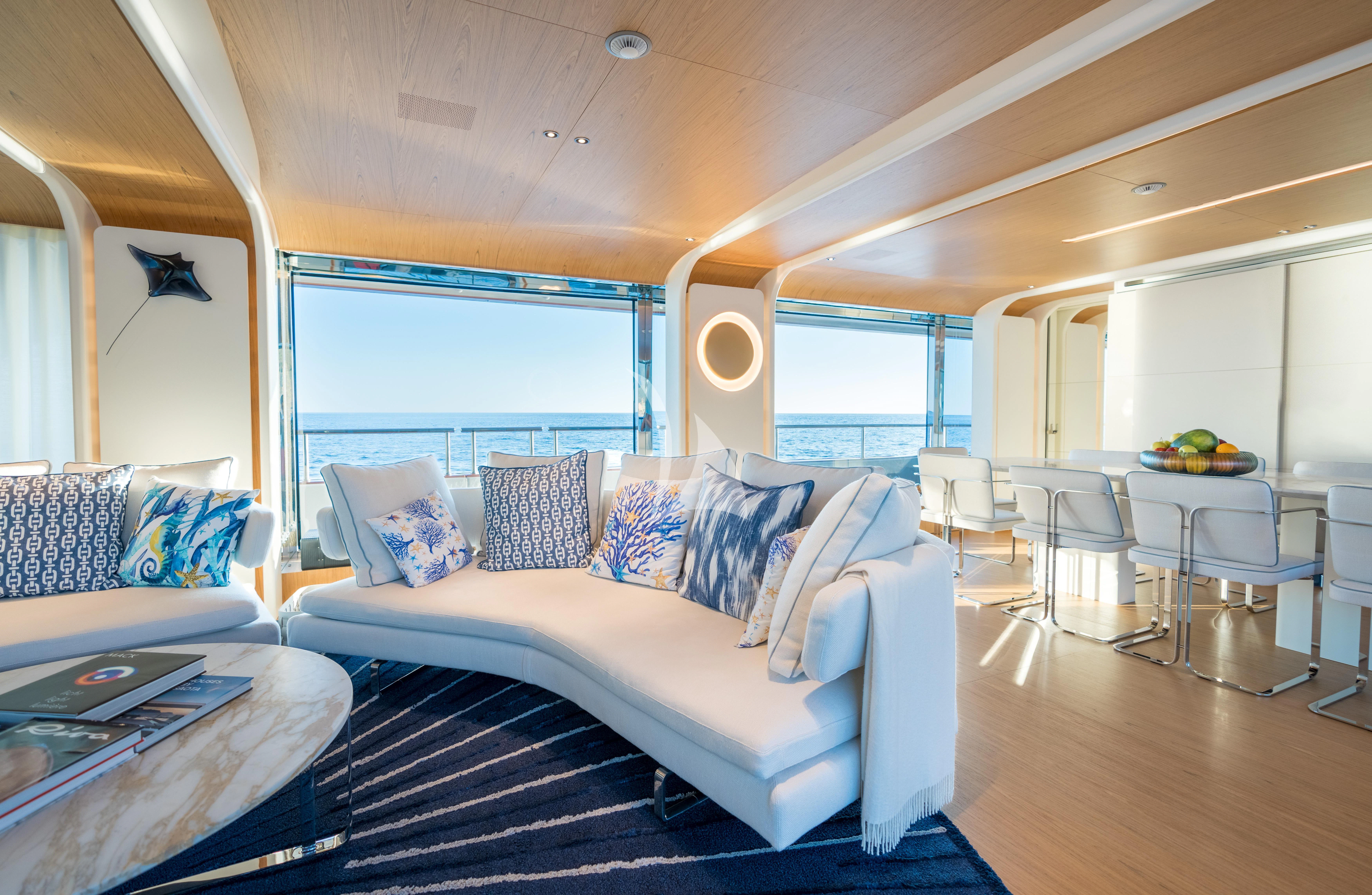 a large living room with a large window aboard EH2 Yacht for Sale