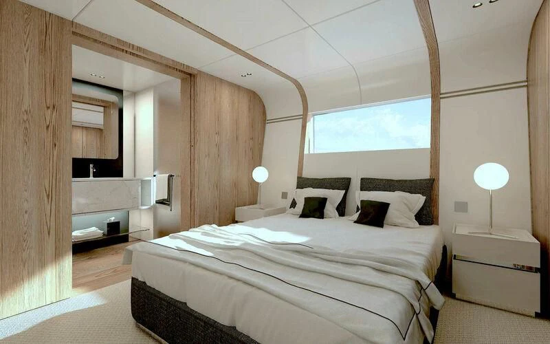 a room with a bed and a window aboard EH2 Yacht for Sale