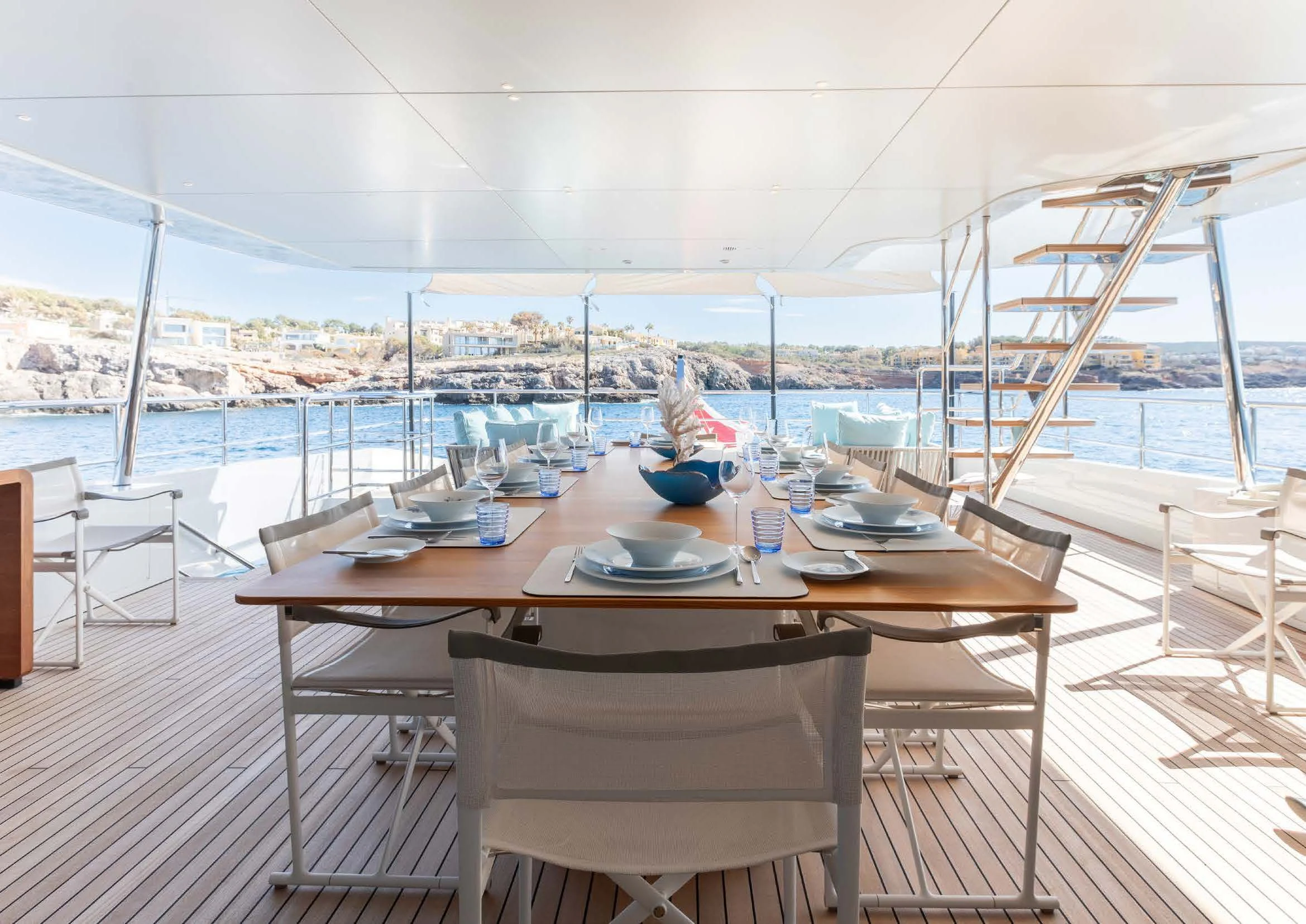 a table set for a meal aboard EH2 Yacht for Sale