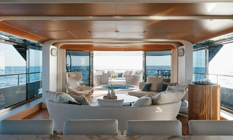 a living room with a large window aboard EH2 Yacht for Sale
