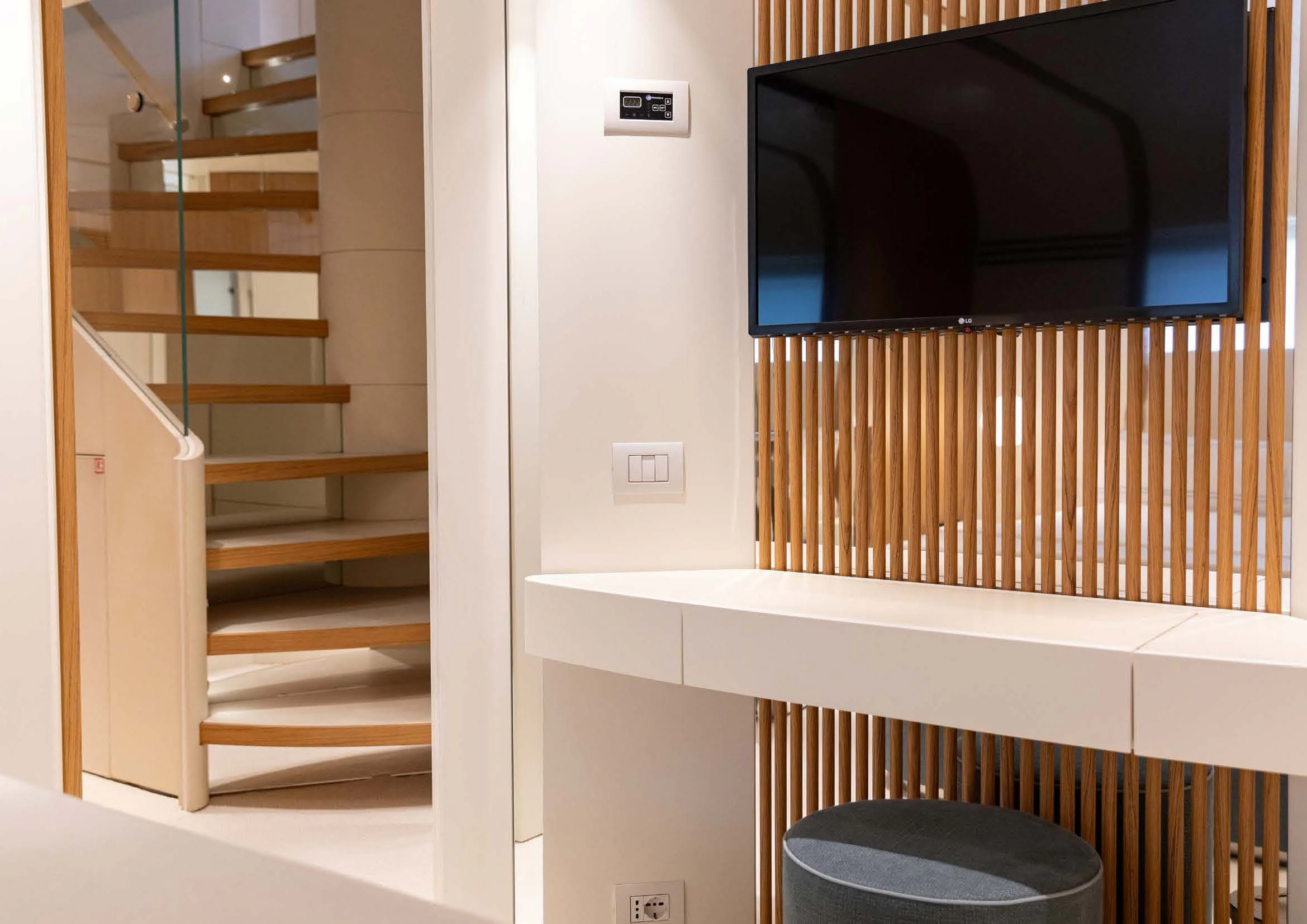 a room with a staircase and a window aboard EH2 Yacht for Sale