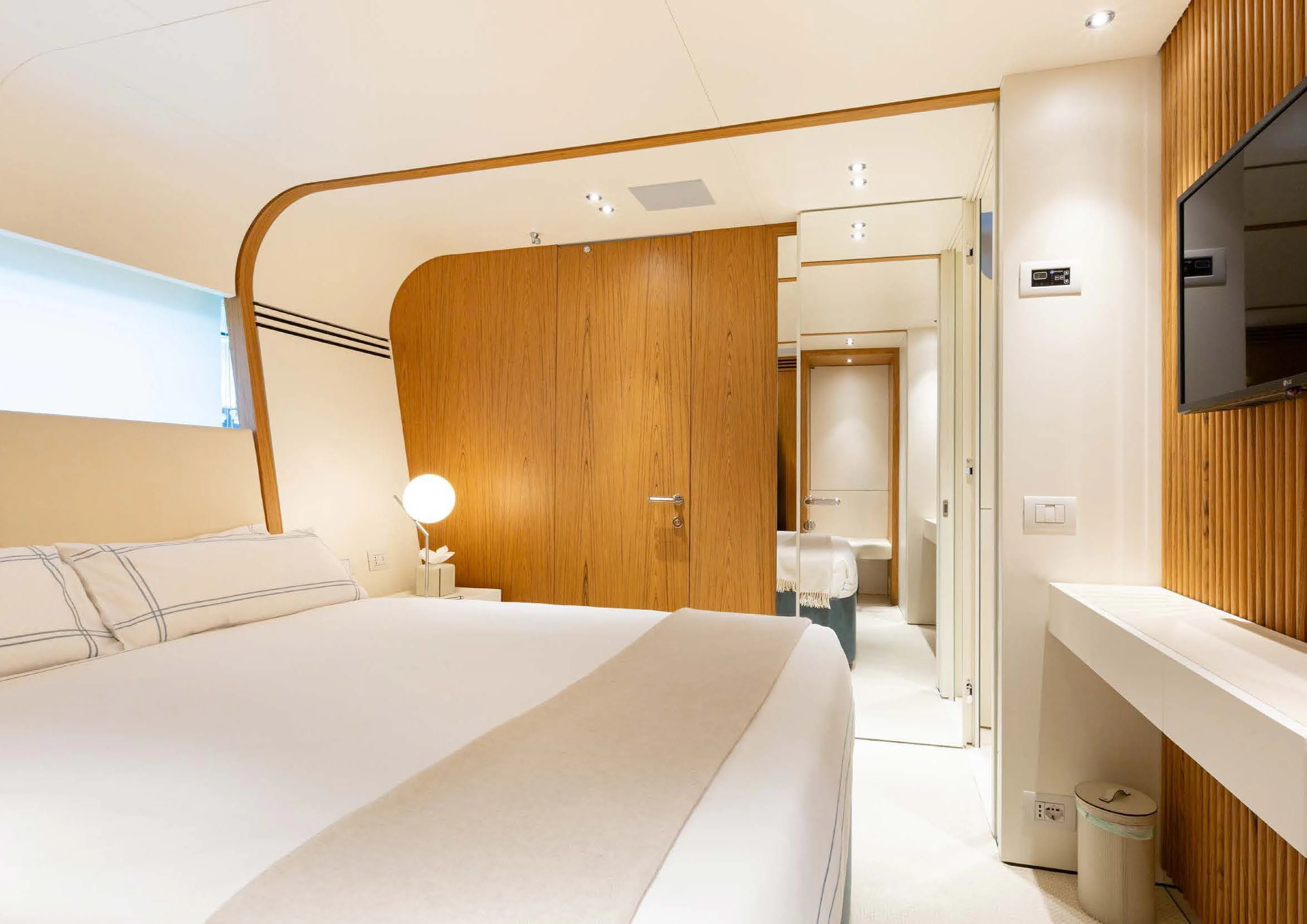 a hotel room with a bed aboard EH2 Yacht for Sale