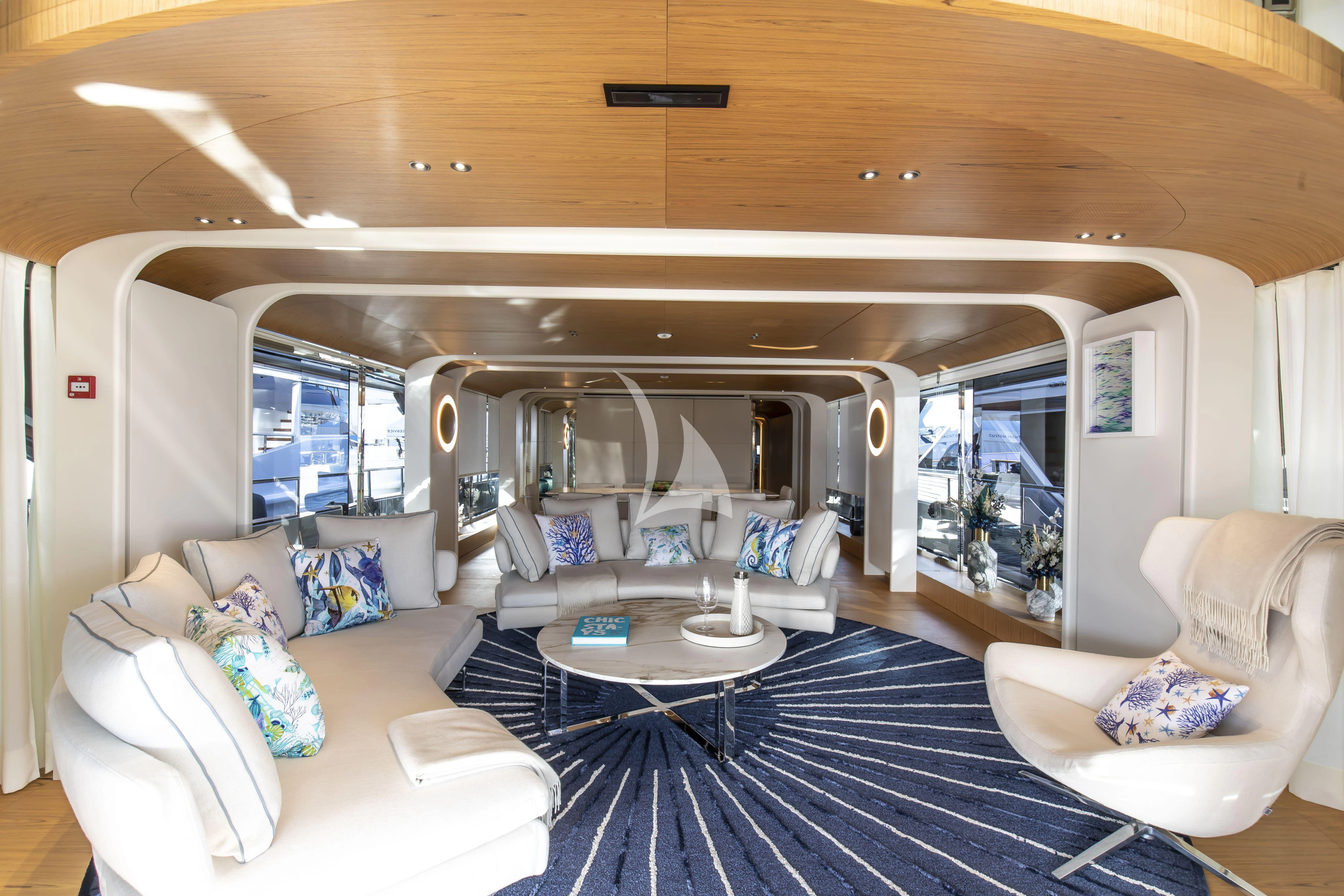 a living room with a large window aboard EH2 Yacht for Sale